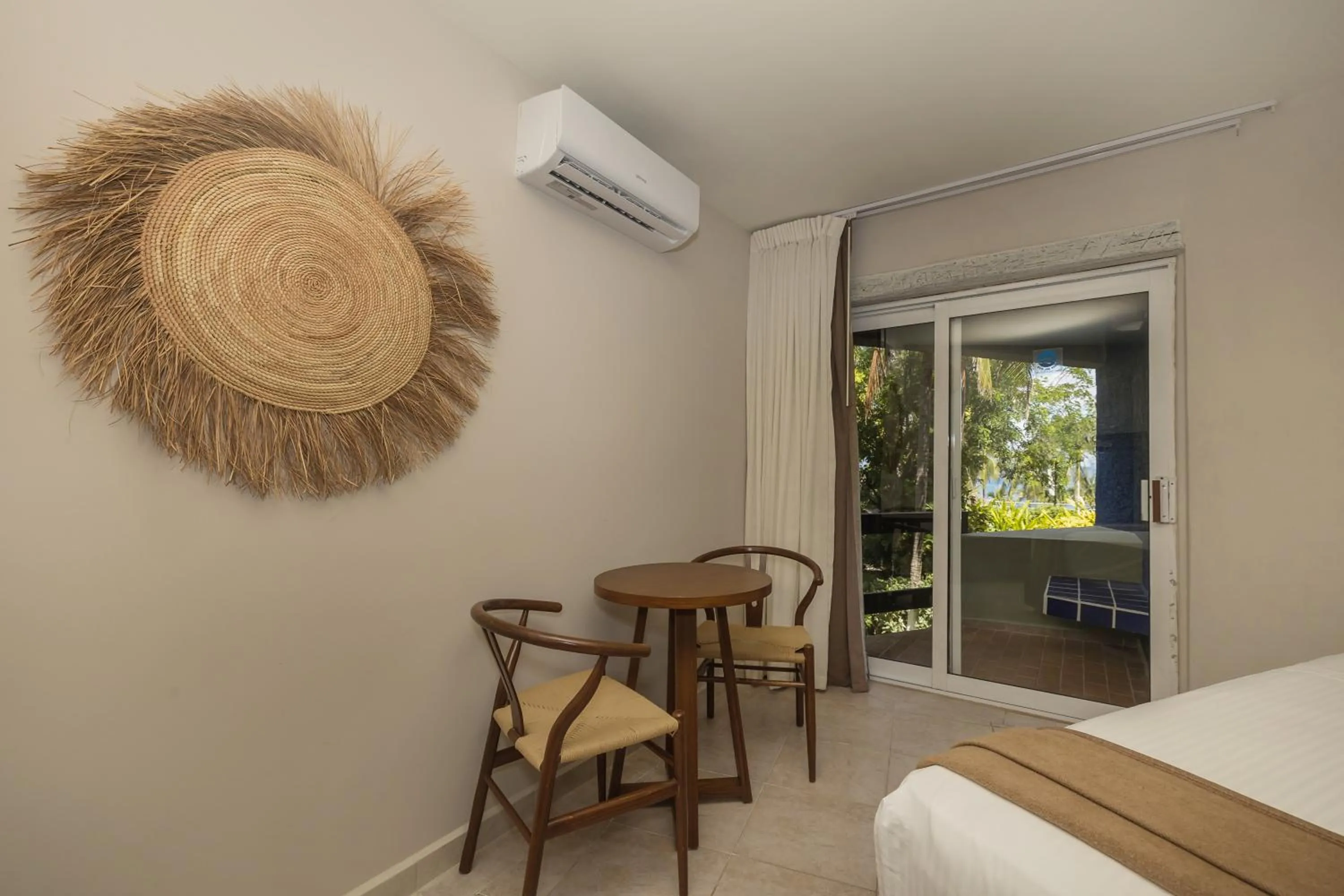 Seating area, Bed in Casa del Mar Cozumel Hotel & Dive Resort with free access to an exclusive beach club