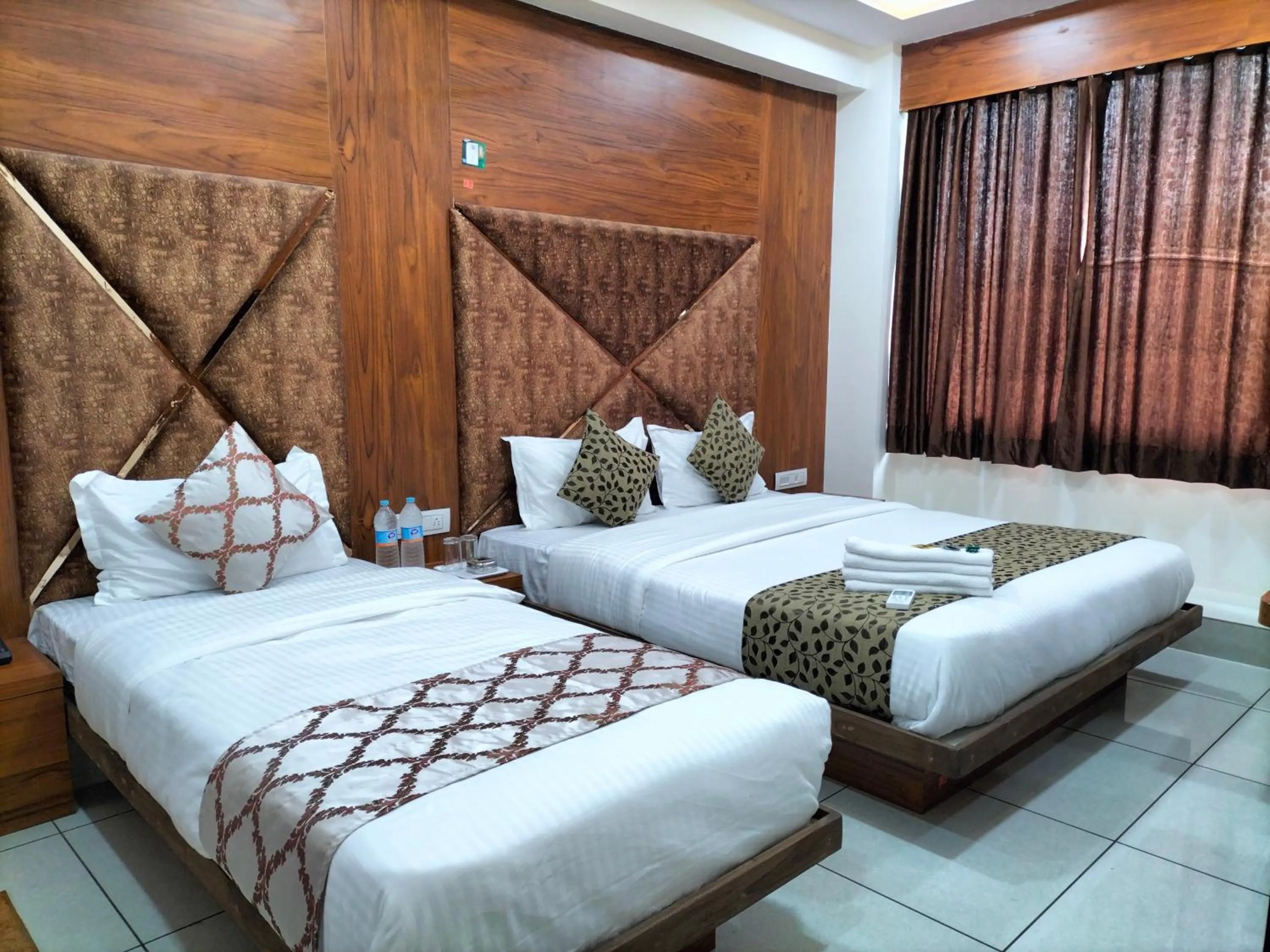 Bed in Hotel Divya Palace