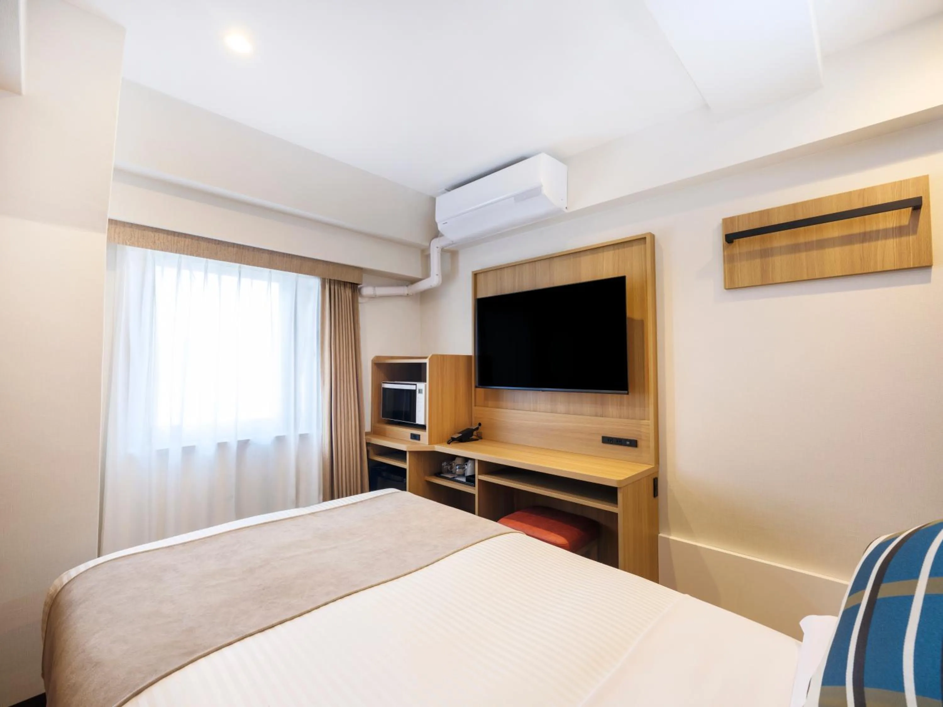 Bed in HOTEL MYSTAYS Higashi Jujo