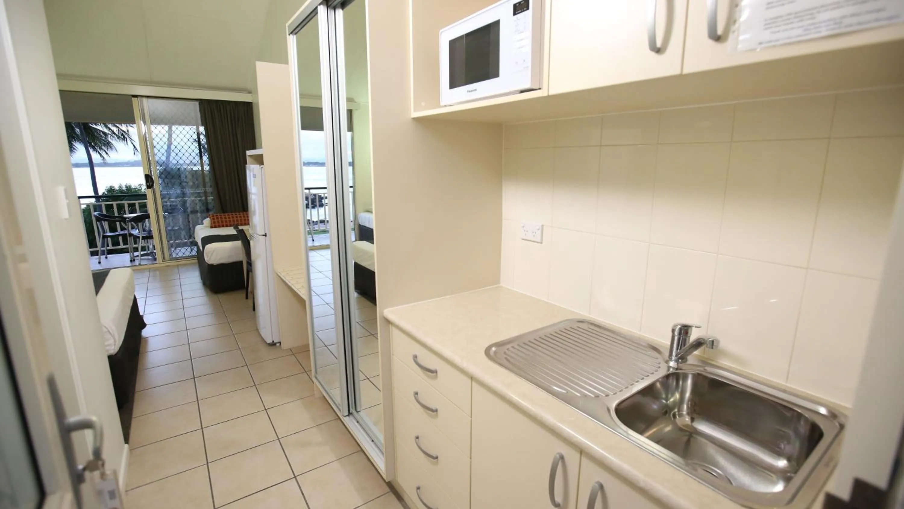 Kitchen or kitchenette in Whitsunday Sands Resort