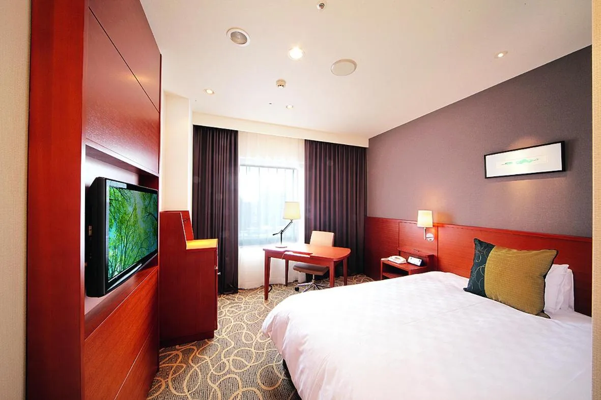 Bed in Akita Castle Hotel