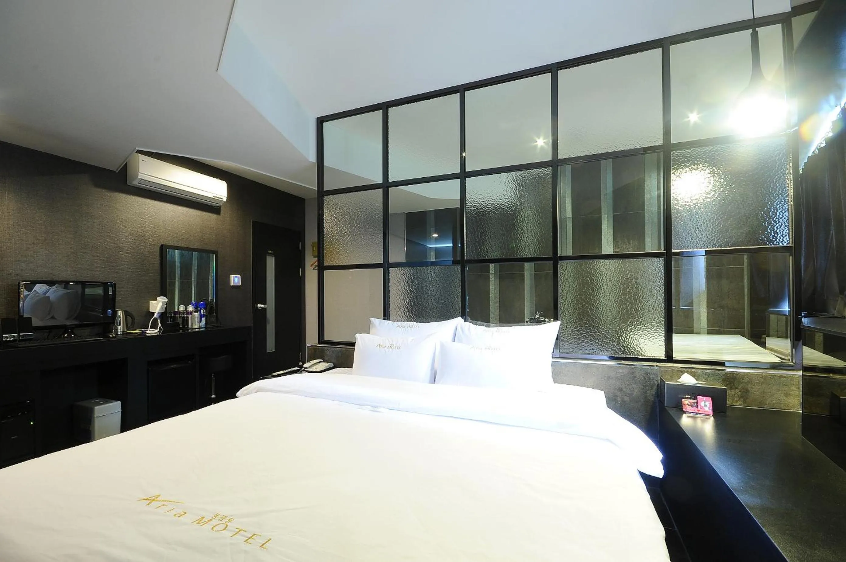 Bed in Boutique Hotel Aria Nampo