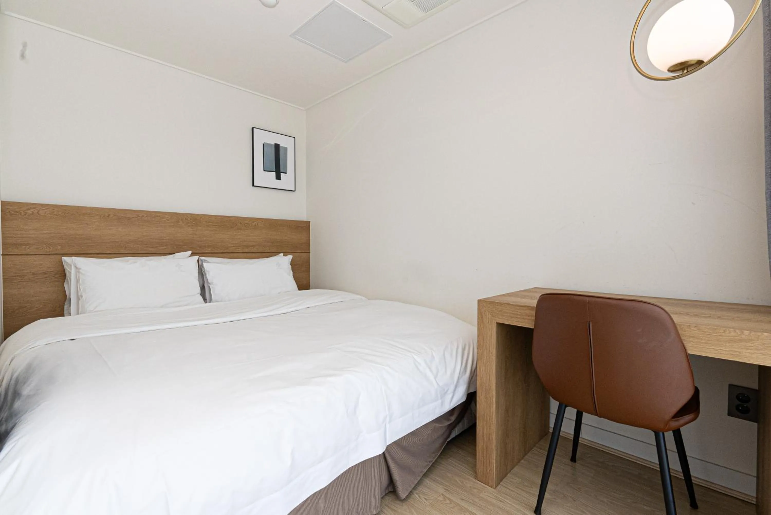 Property building, Bed in Hotel The Grang Jungmun