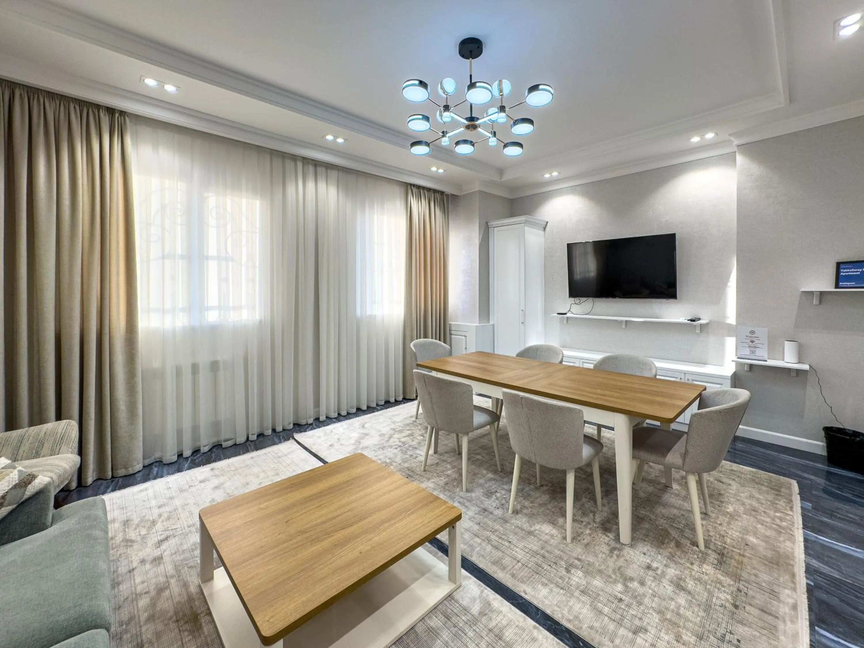 Communal lounge/ TV room in YakkaSaray Premium Apartment