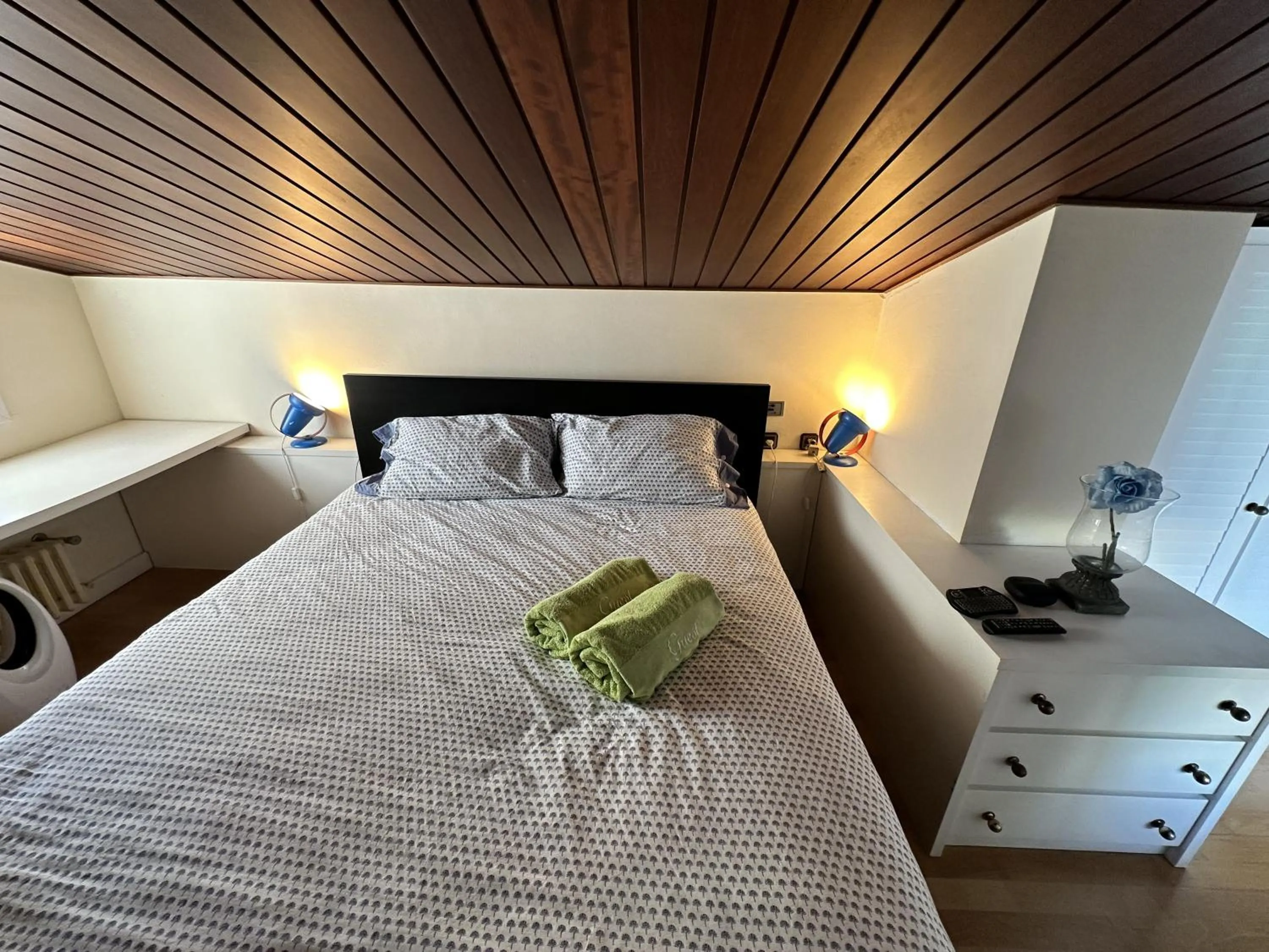 Bed in Solo Atico Guest Suites