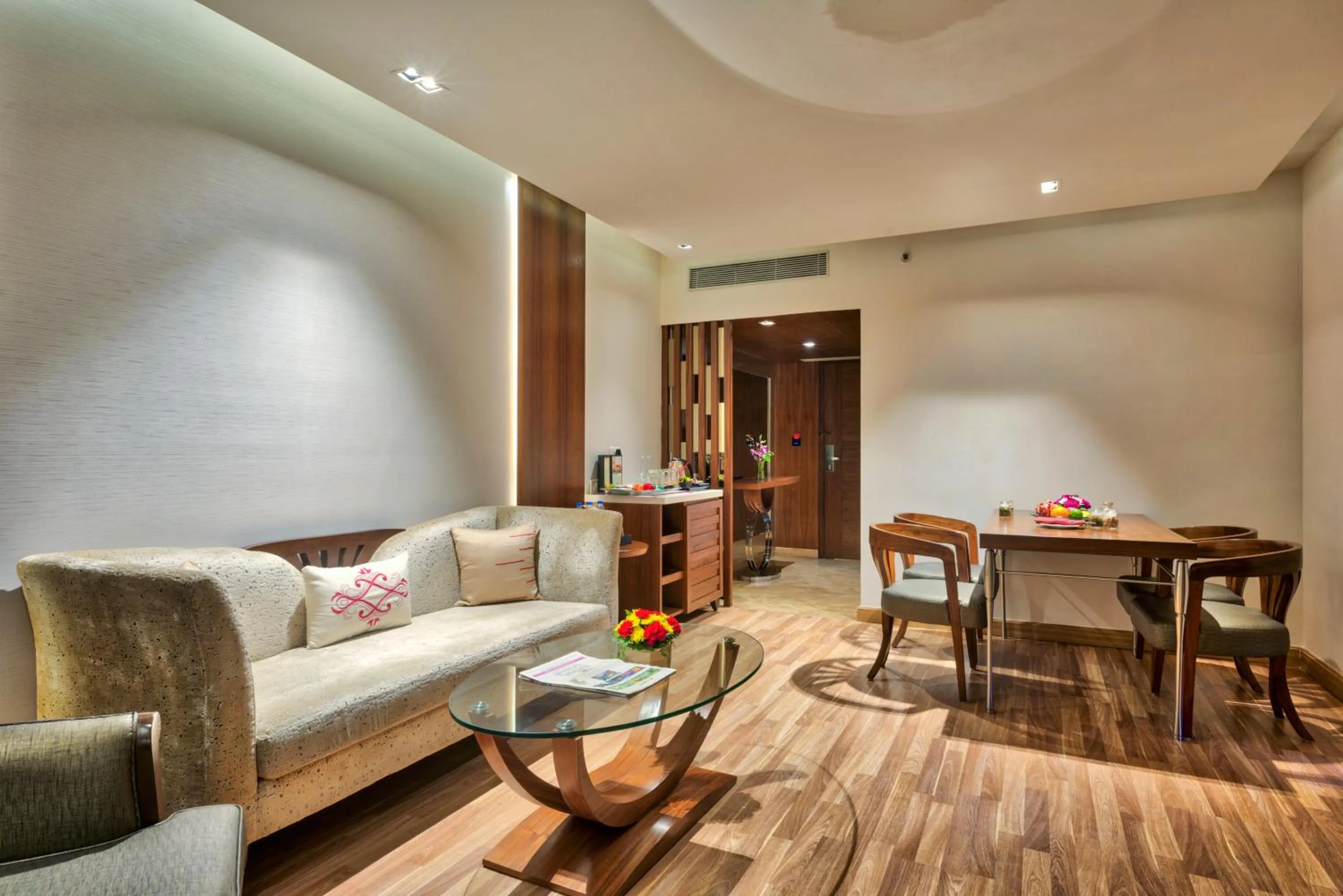 Living room in Grand Chennai by GRT Hotels