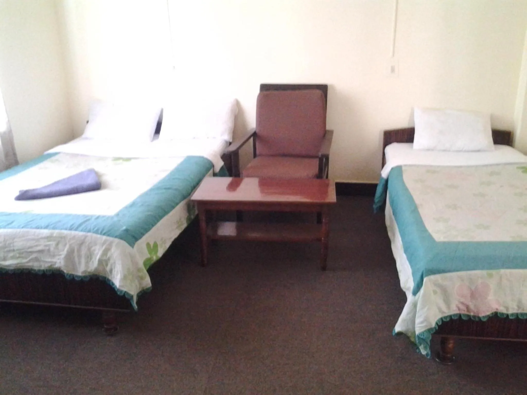 Bed in New United Hotel