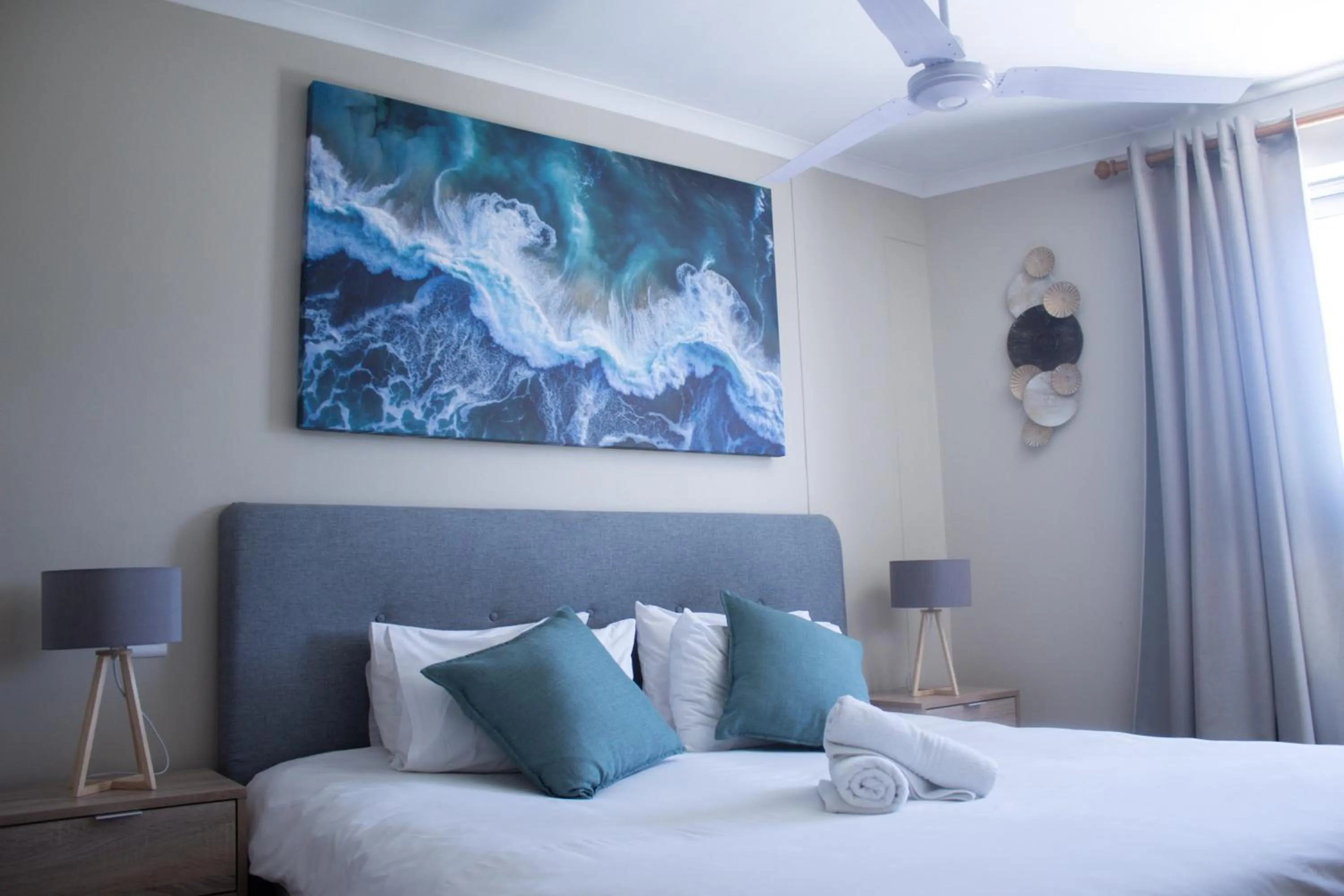 Bed in Ocean Breeze Hotel