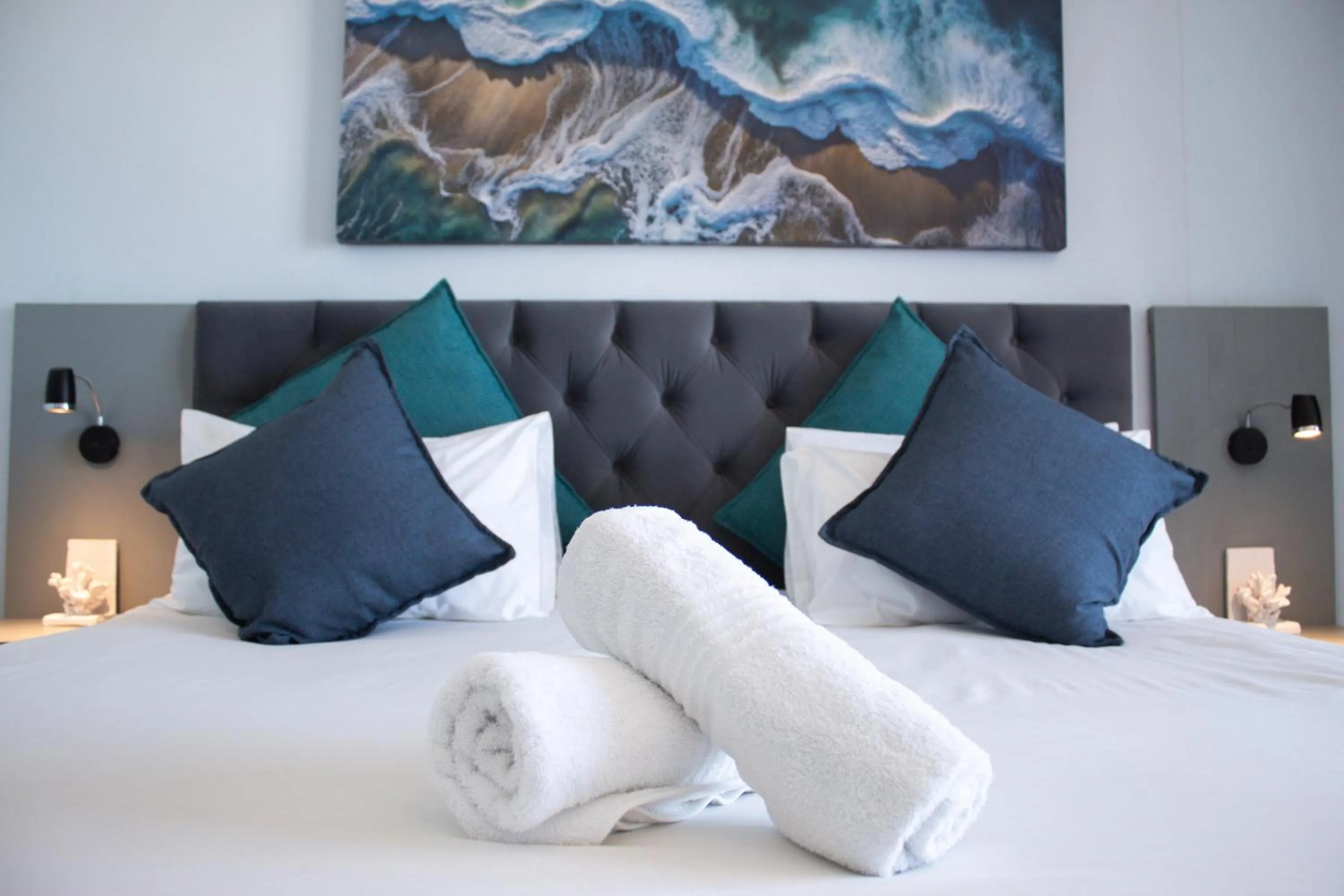 Bed in Ocean Breeze Hotel