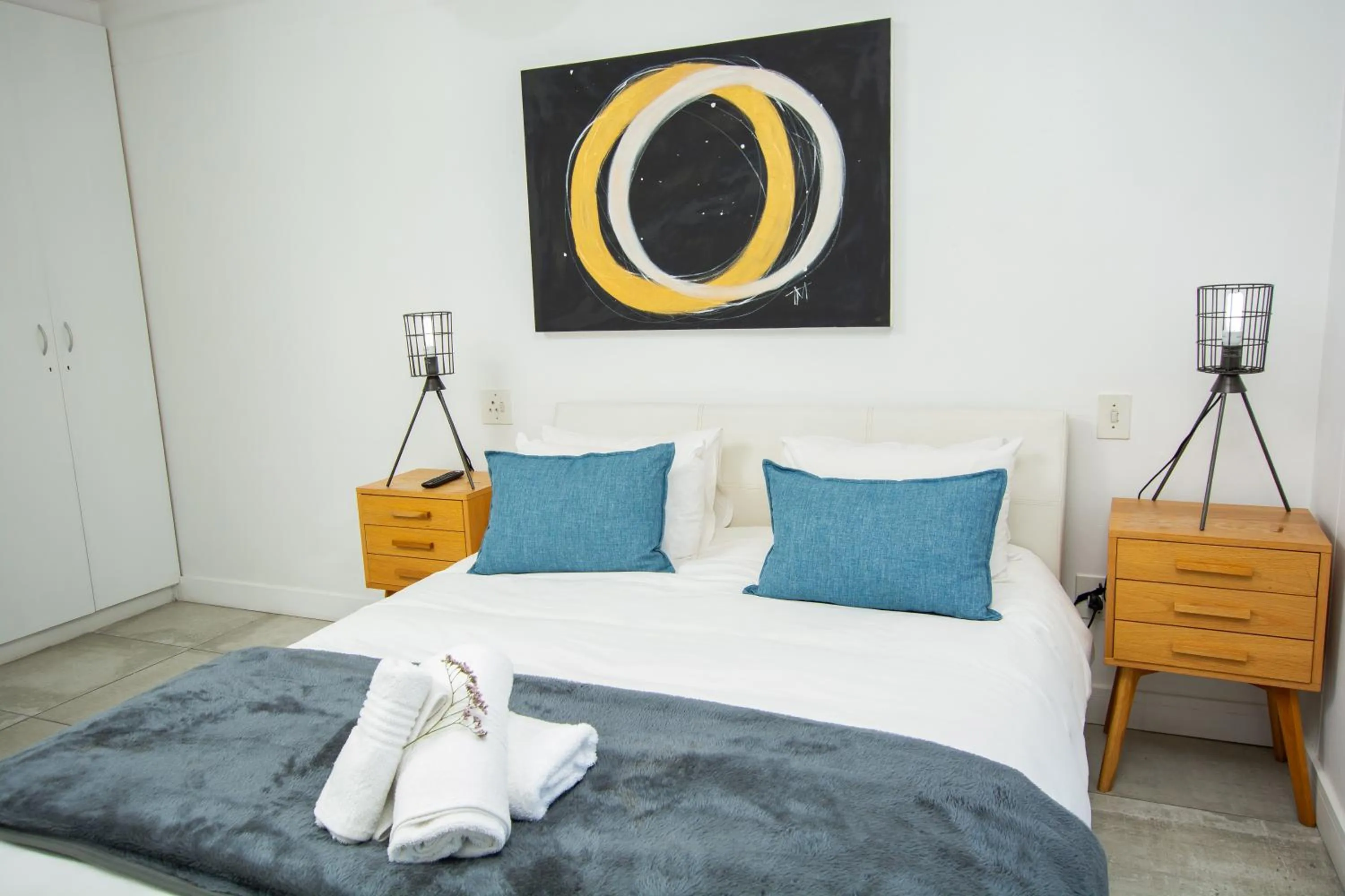 Bed in Ocean Breeze Hotel