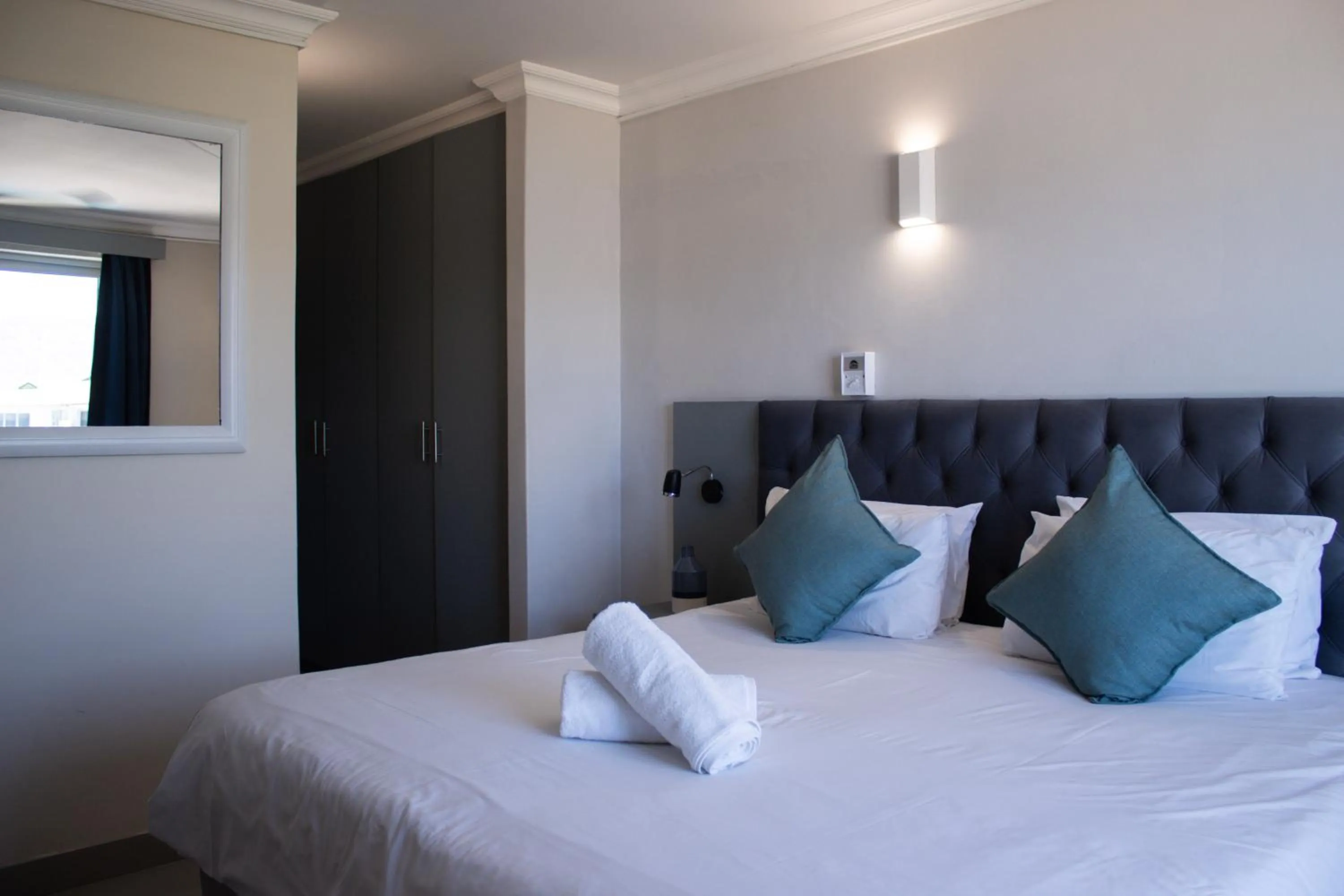 Bed in Ocean Breeze Hotel