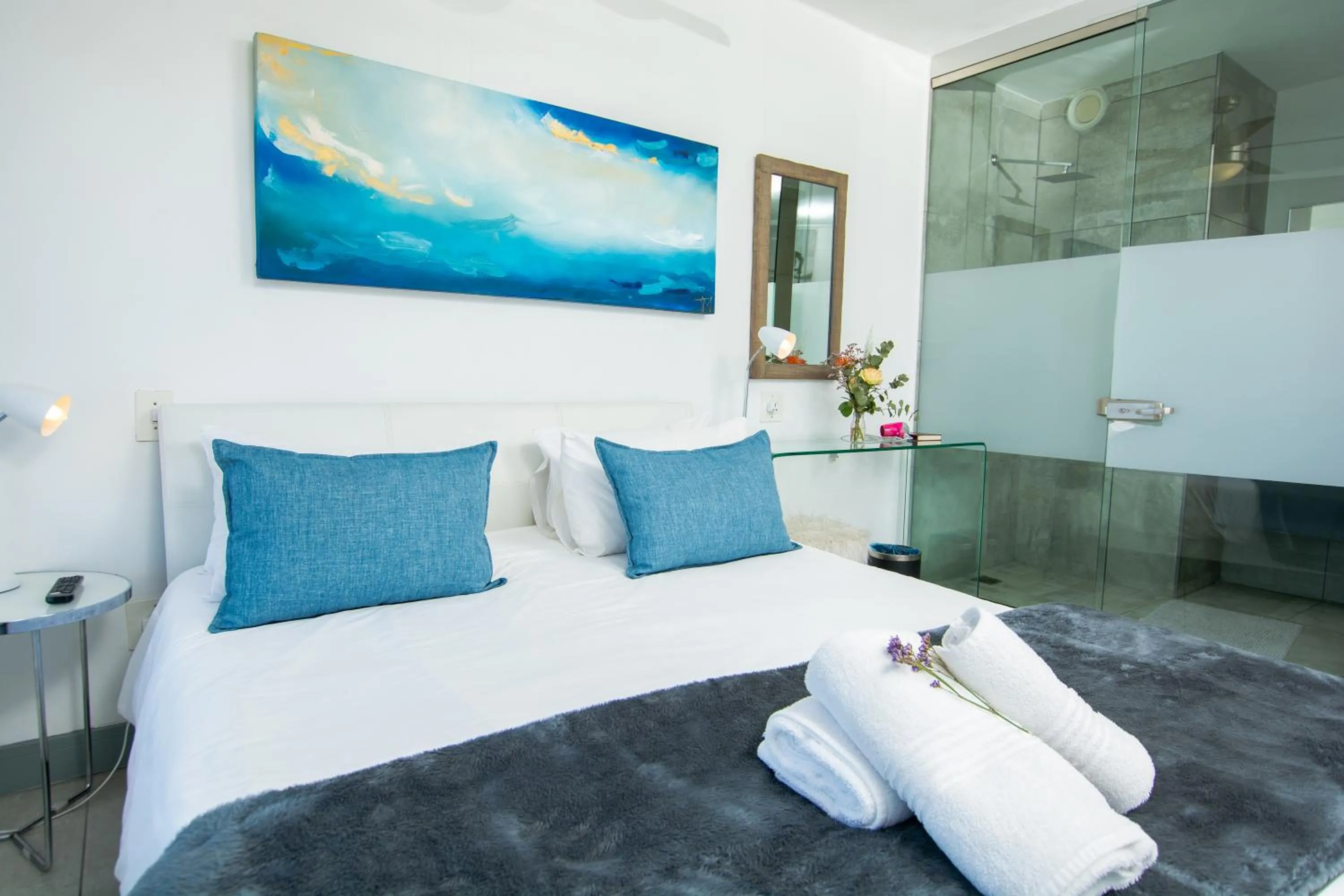 Bed in Ocean Breeze Hotel