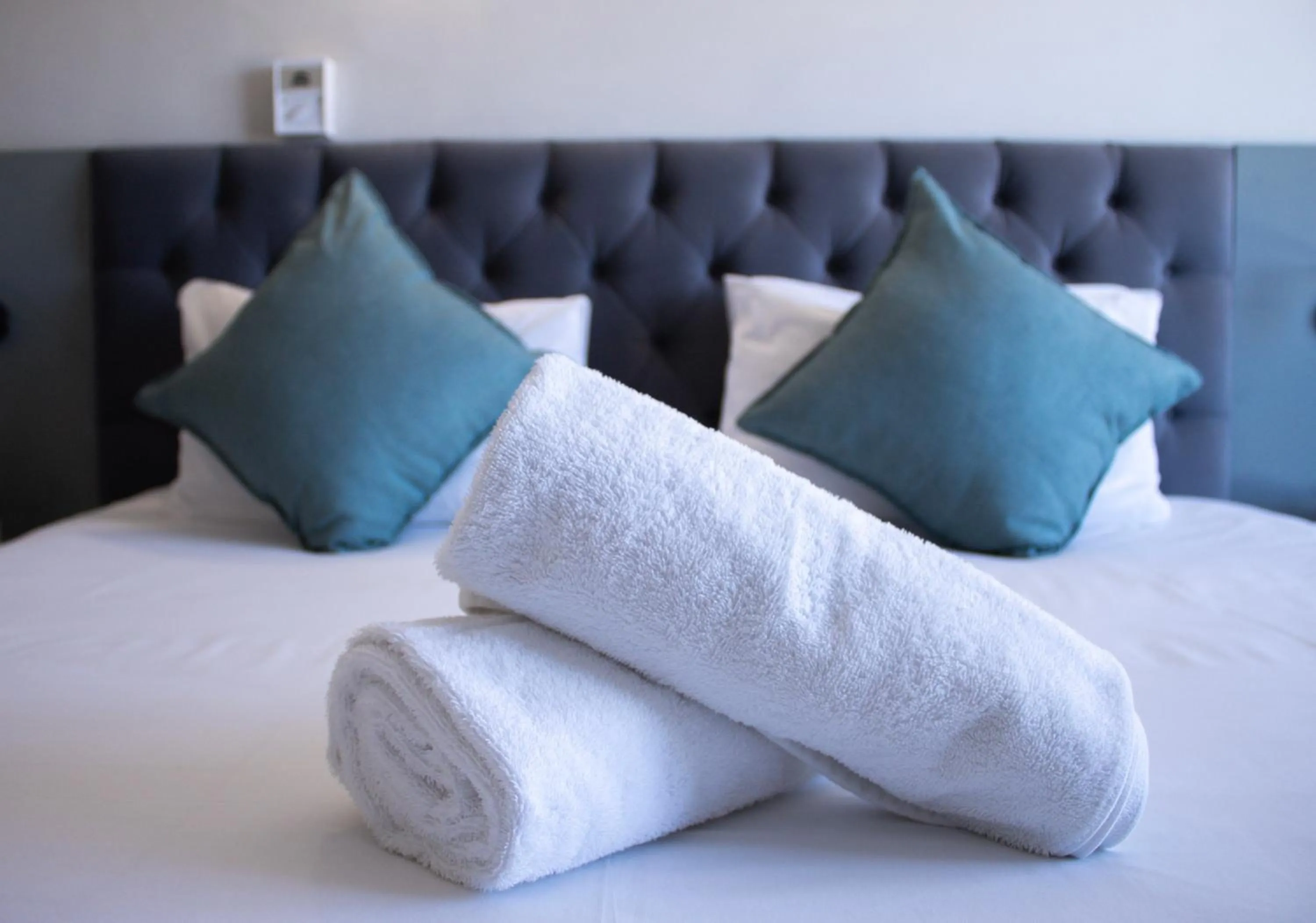 Bed in Ocean Breeze Hotel