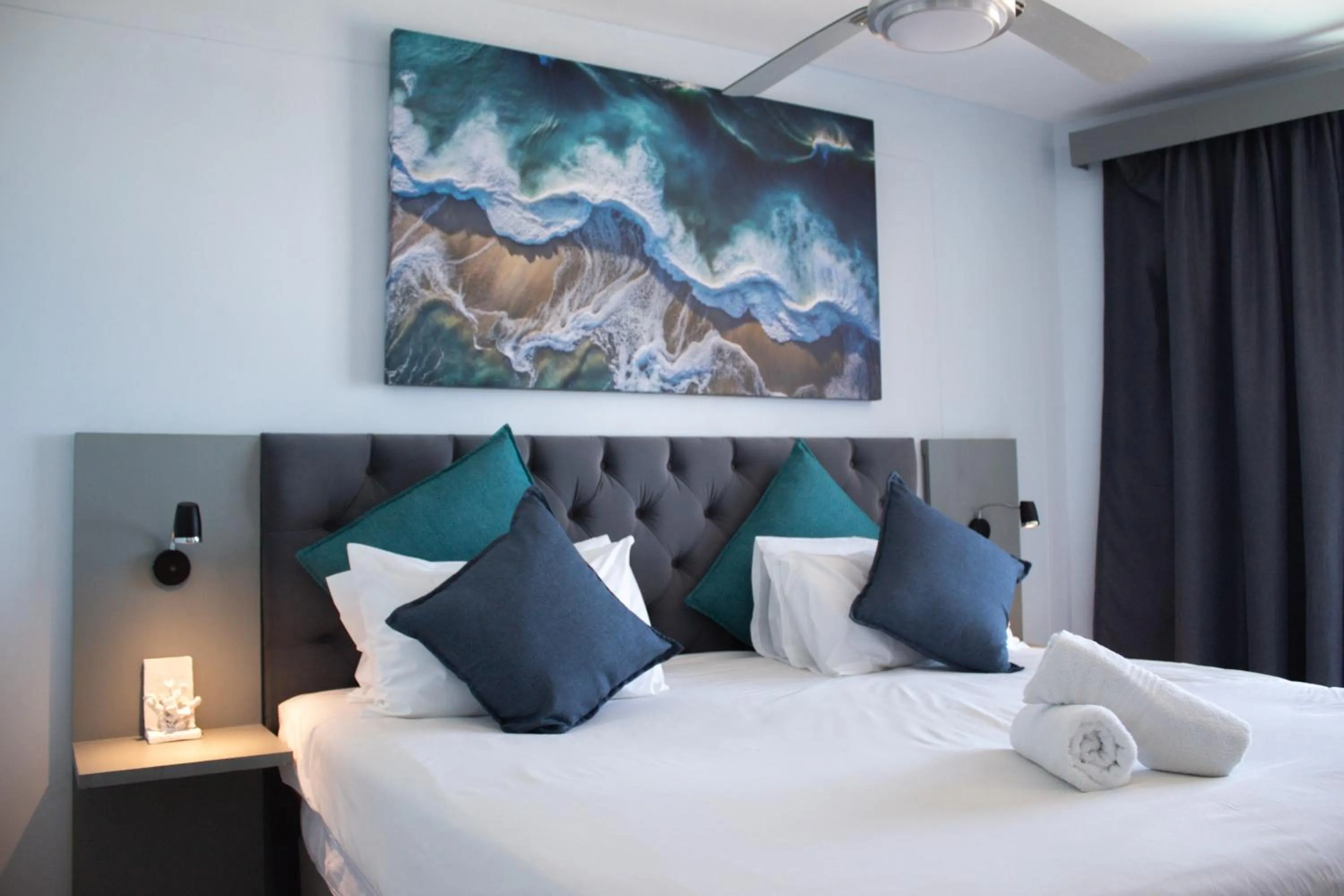 Bed in Ocean Breeze Hotel