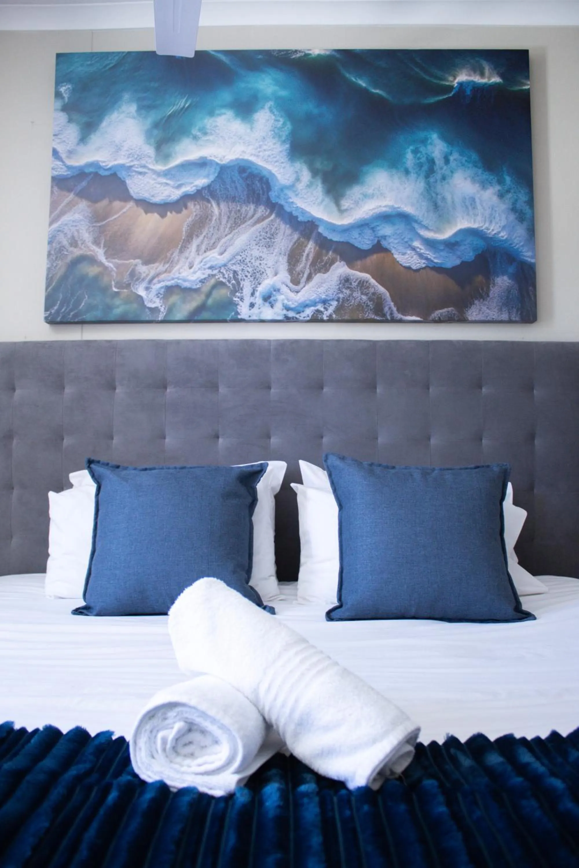 Bed in Ocean Breeze Hotel