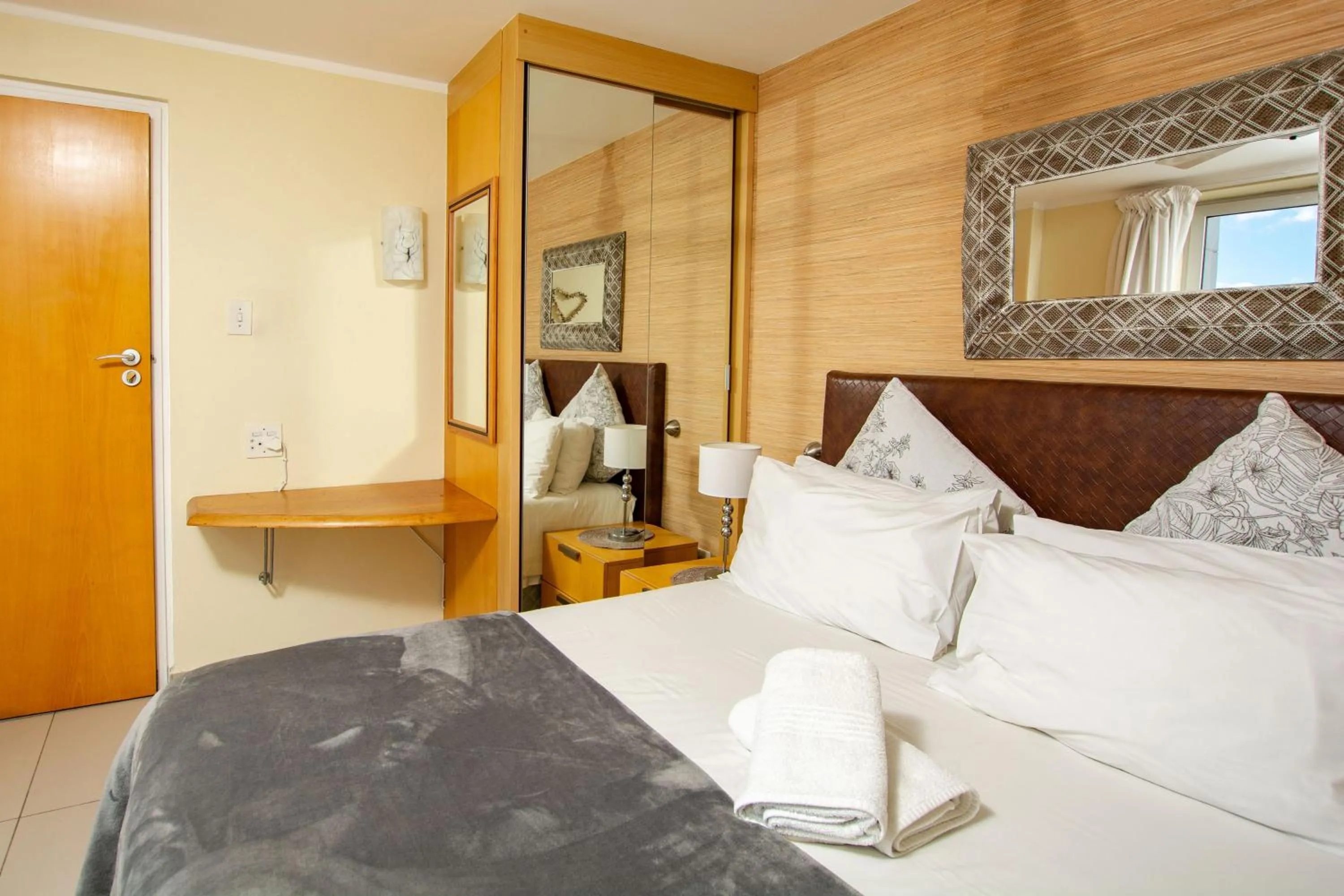 Bed in Ocean Breeze Hotel