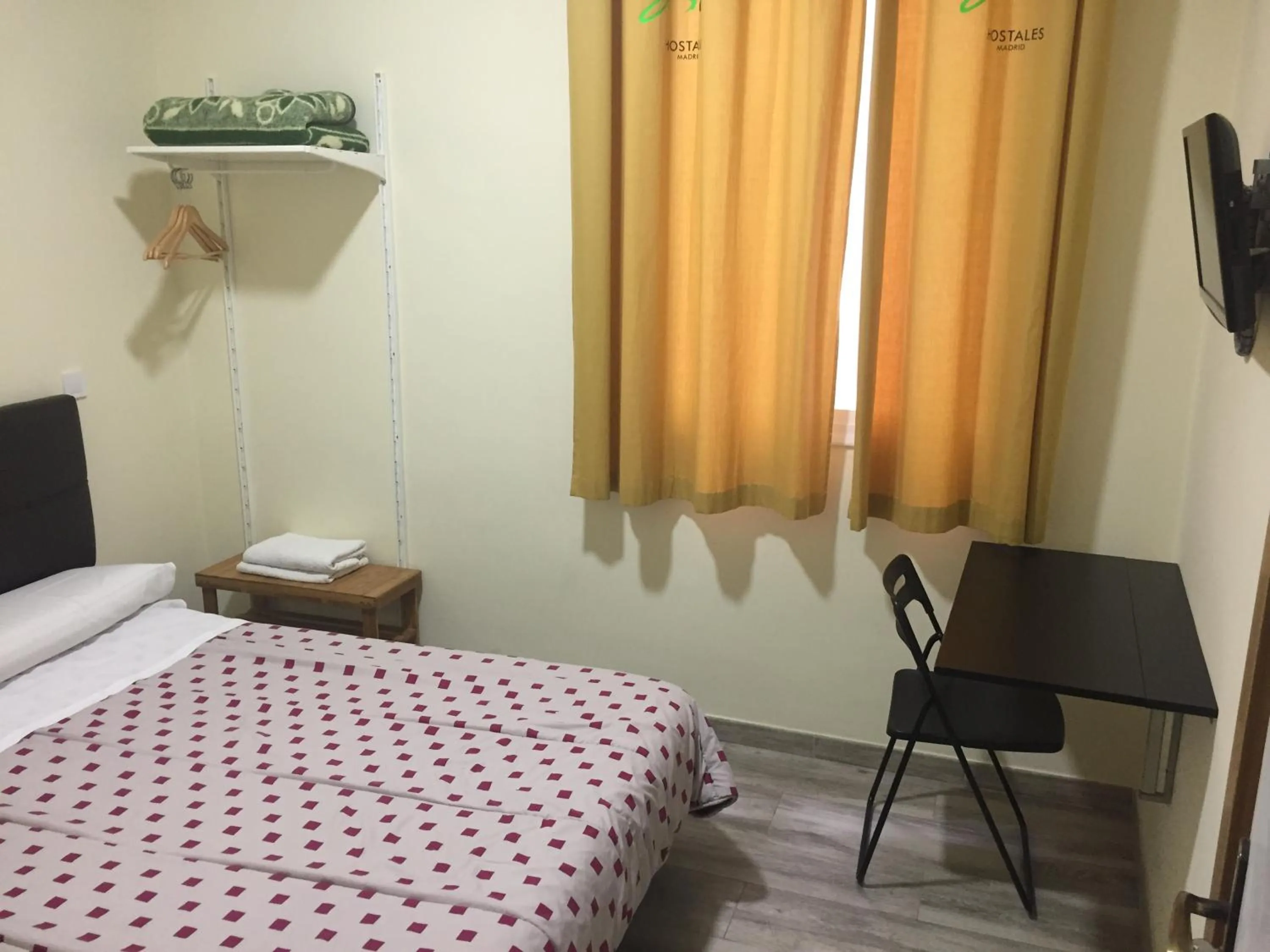 Photo of the whole room, Bed in JQC Rooms