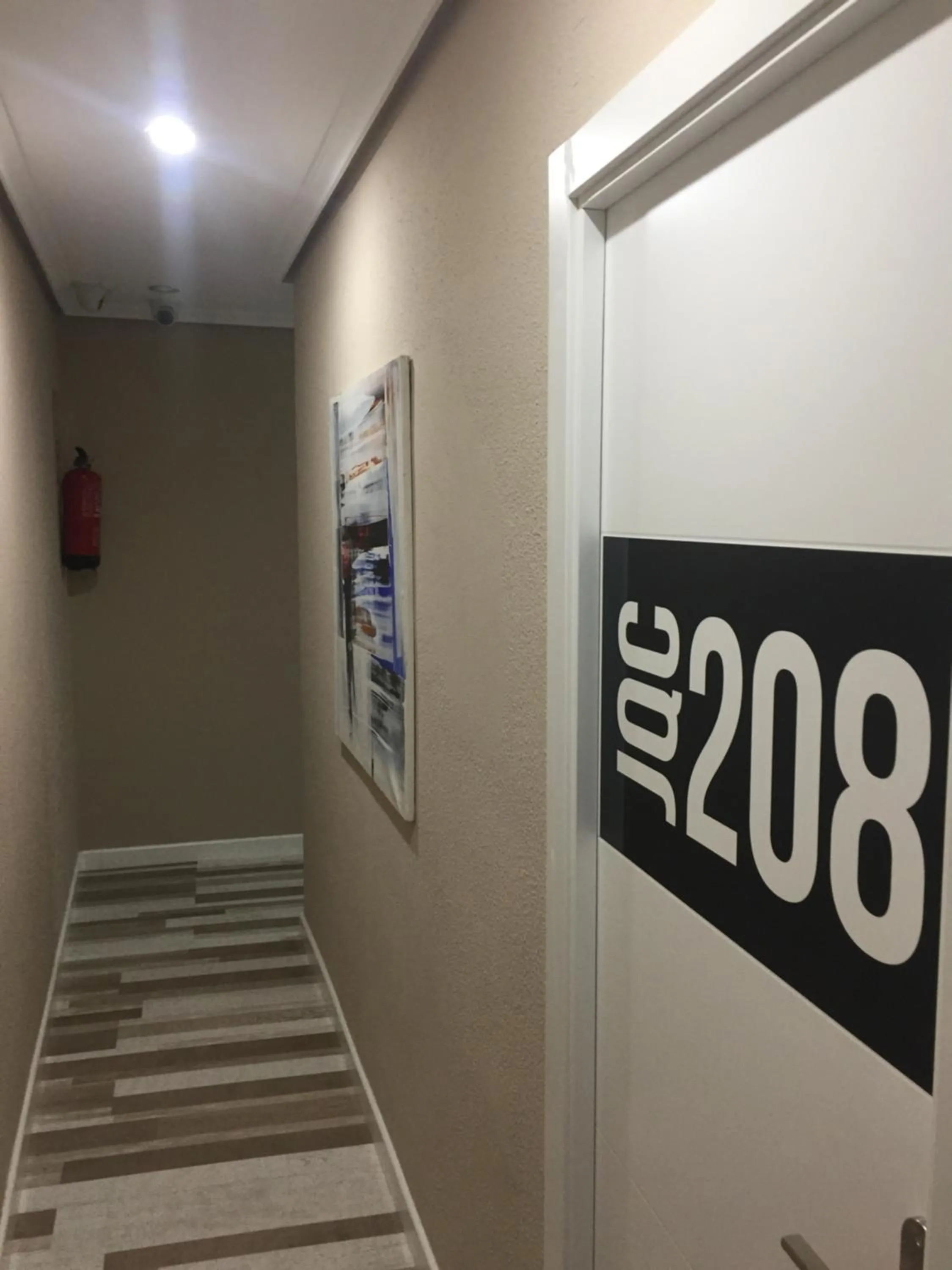 Property logo or sign in JQC Rooms