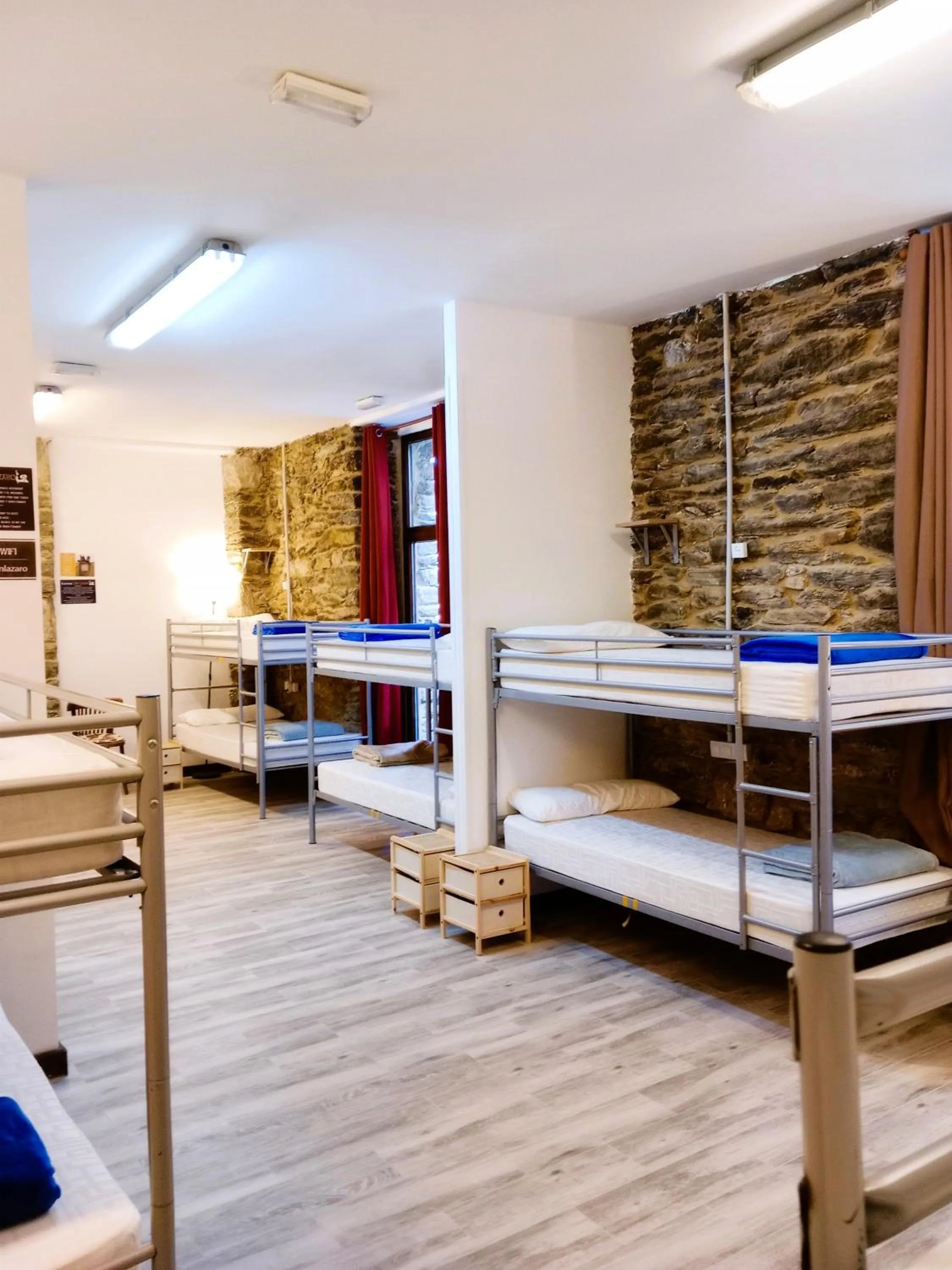 Photo of the whole room, Bed in Albergue San Lázaro