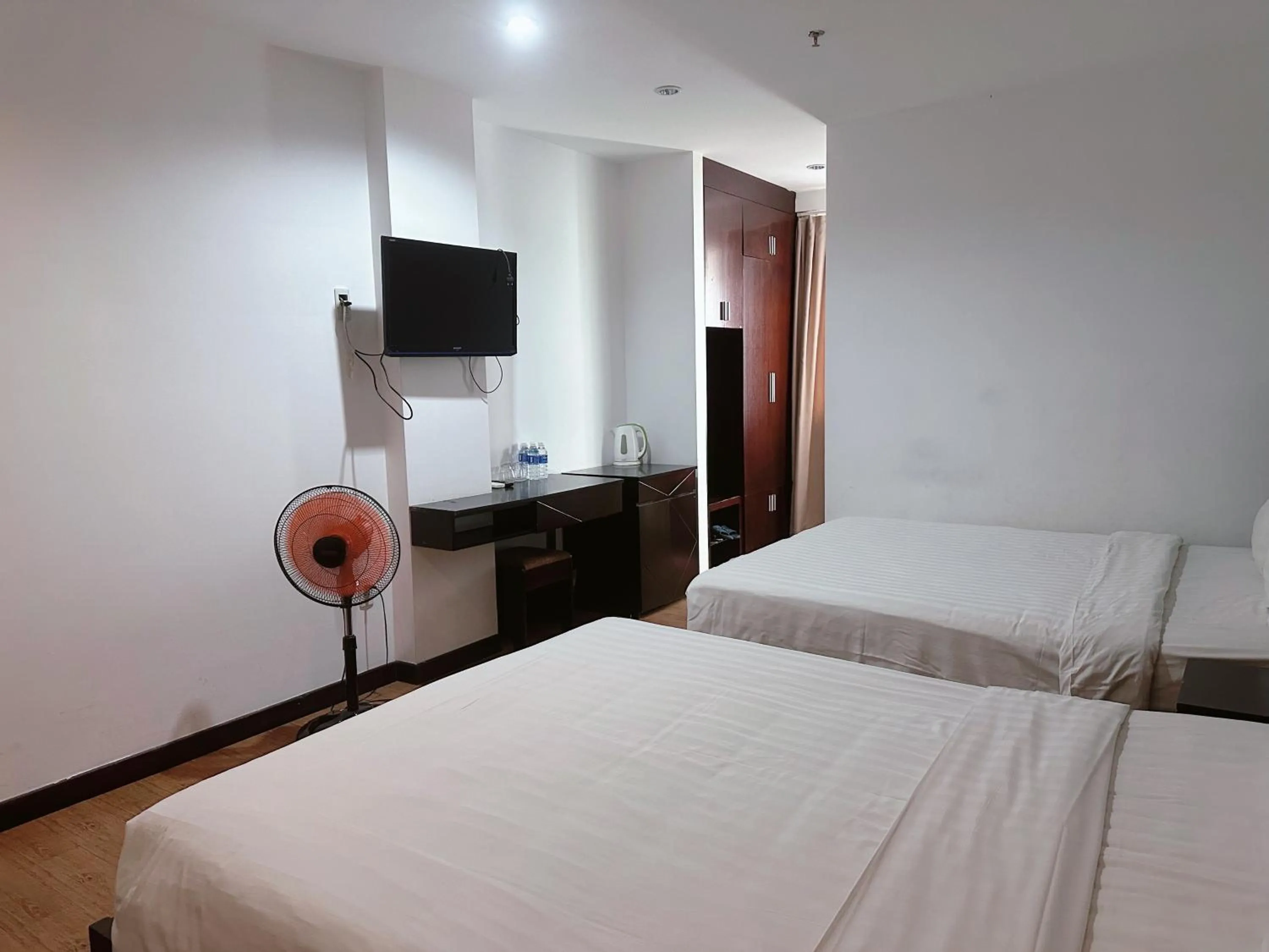 Bed in Dragon Sea Hotel