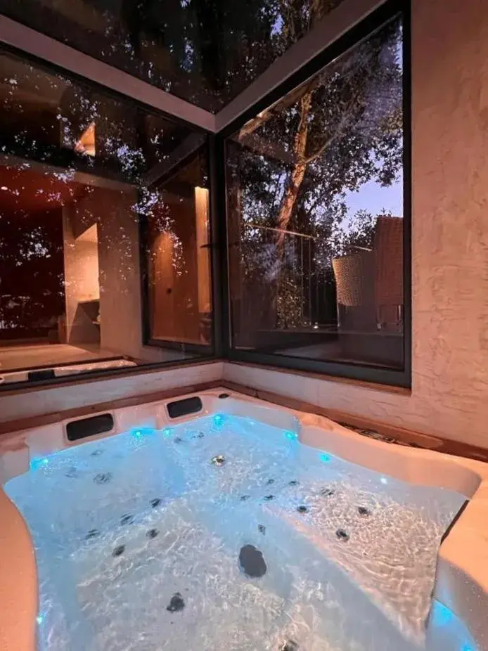 Deluxe Bungalow with private Jacuzzi in Quinta do Pedregal Hotel & Spa Deluxe Bungalow with private Jacuzzi in Quinta do Pedregal Hotel & Spa