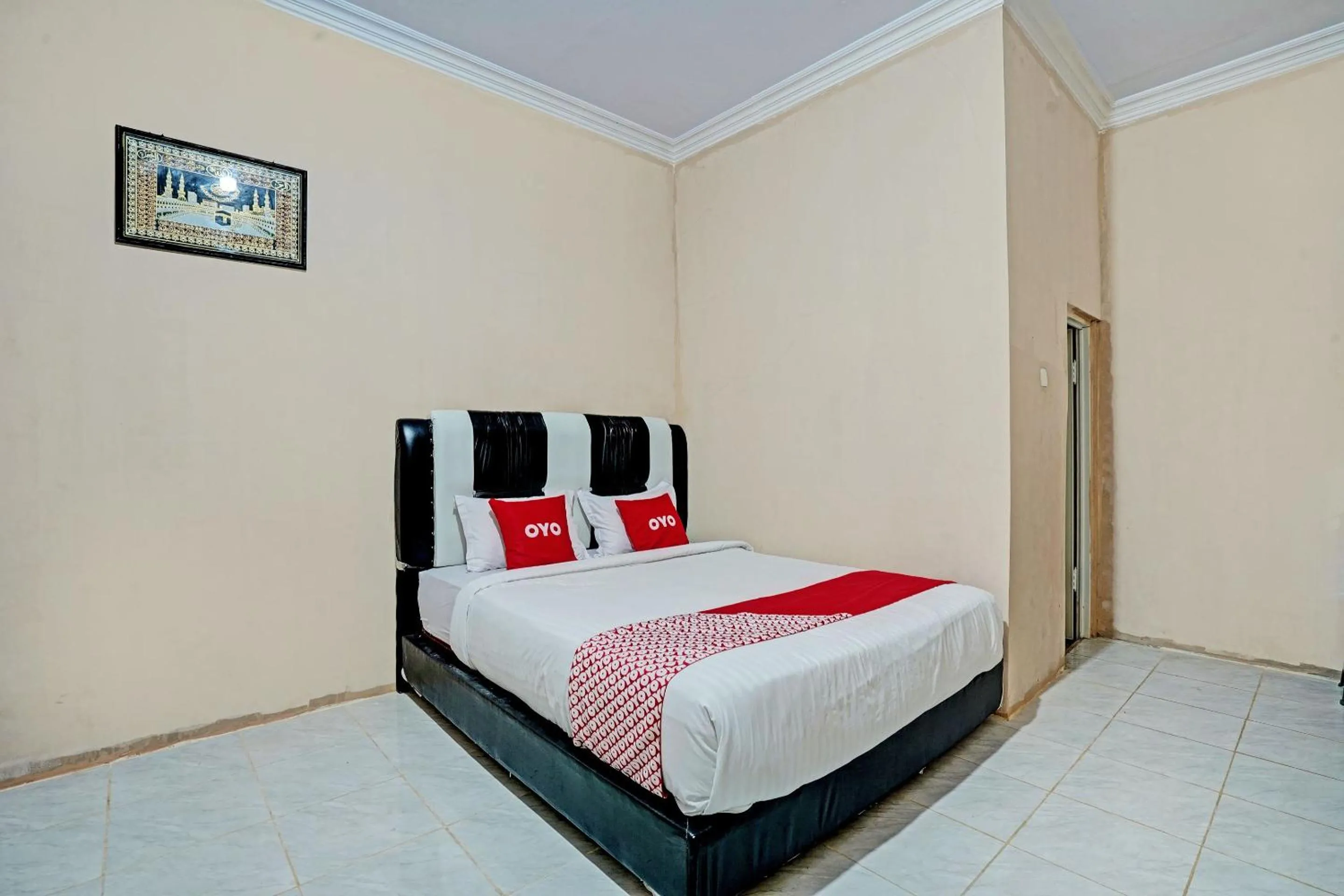 Bedroom in Hotel O Mutiara Homestay Syariah Near TPA / TPSA Nurul Yakin