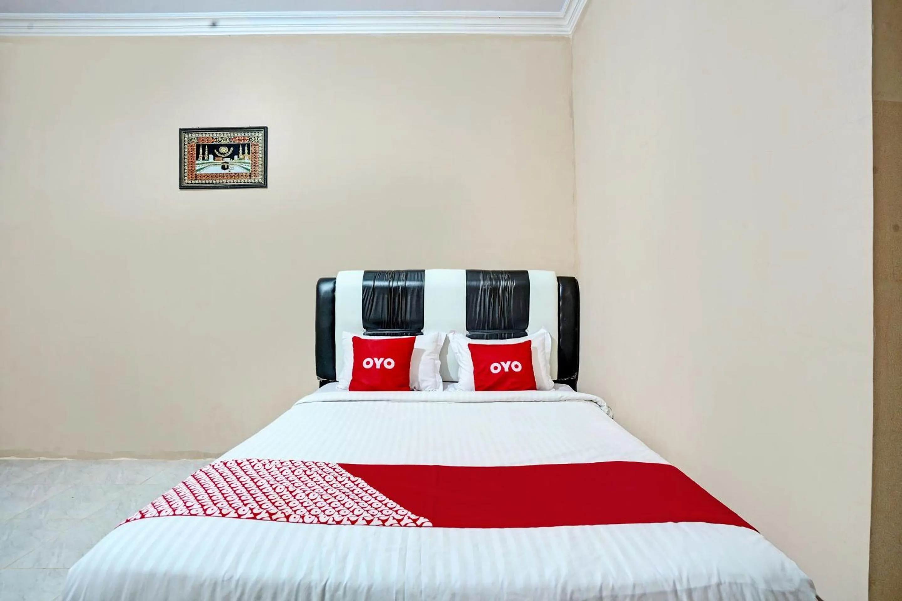 Bedroom in Hotel O Mutiara Homestay Syariah Near TPA / TPSA Nurul Yakin