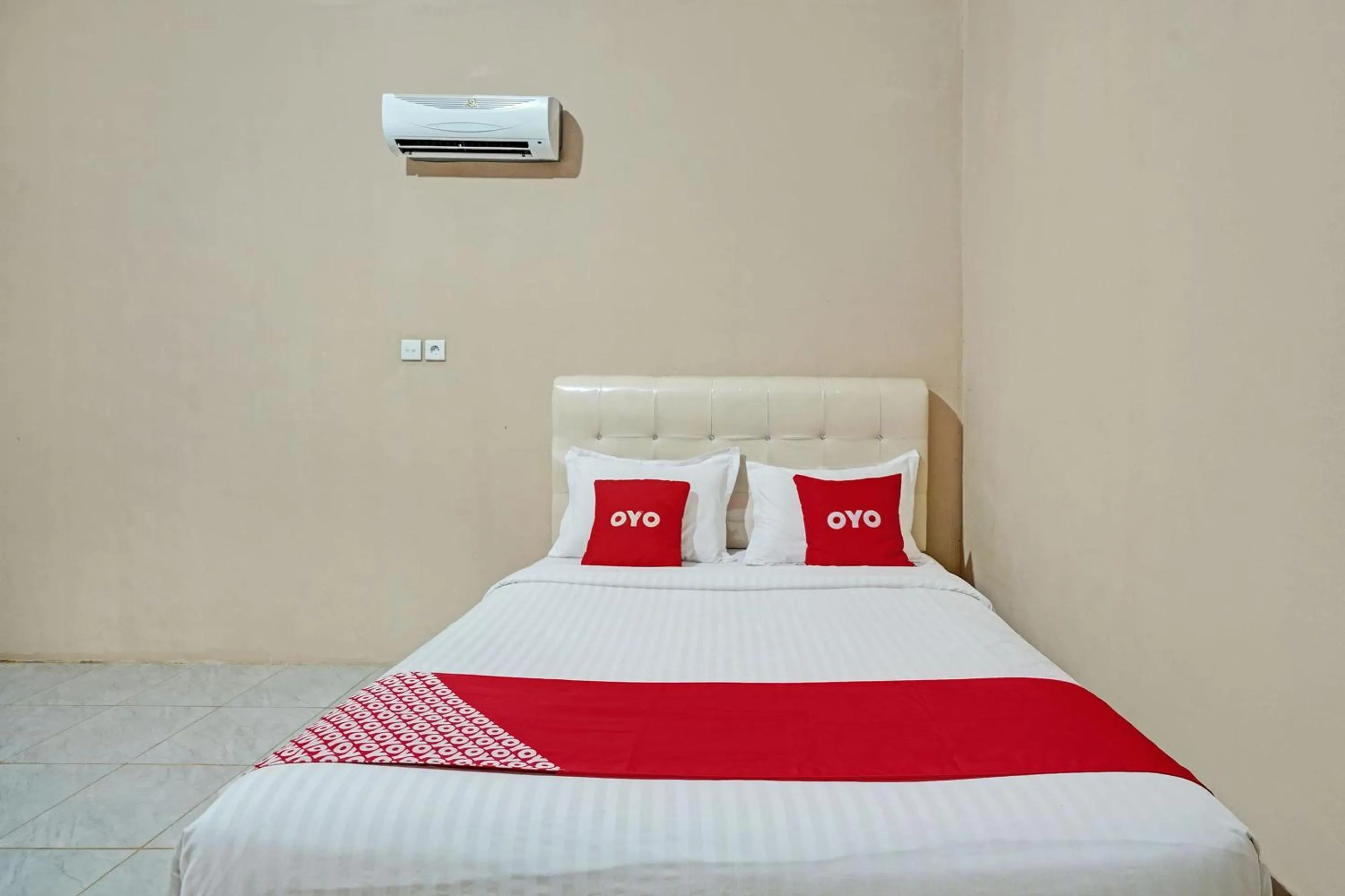 Bedroom in Hotel O Mutiara Homestay Syariah Near TPA / TPSA Nurul Yakin