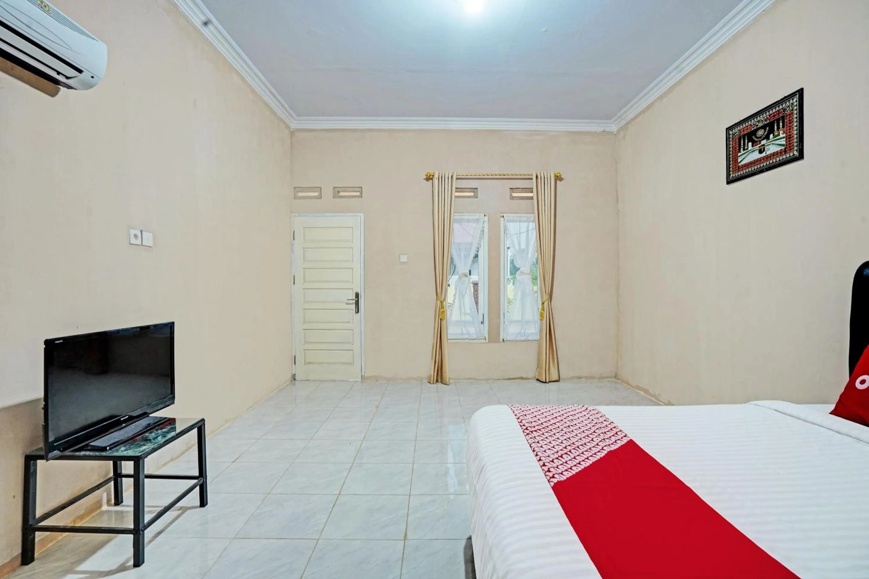 Bedroom in Hotel O Mutiara Homestay Syariah Near TPA / TPSA Nurul Yakin