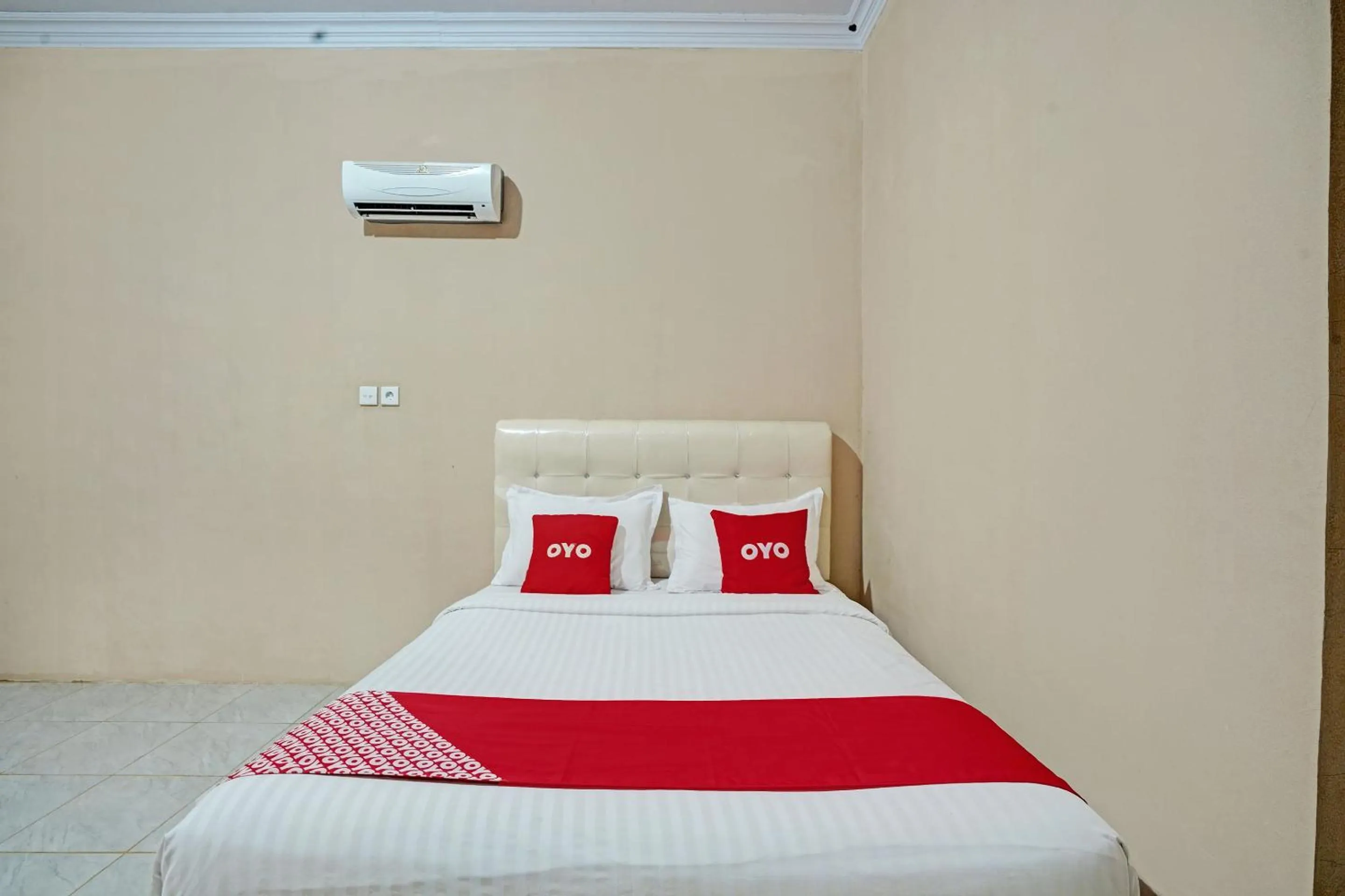 Bedroom in Hotel O Mutiara Homestay Syariah Near TPA / TPSA Nurul Yakin