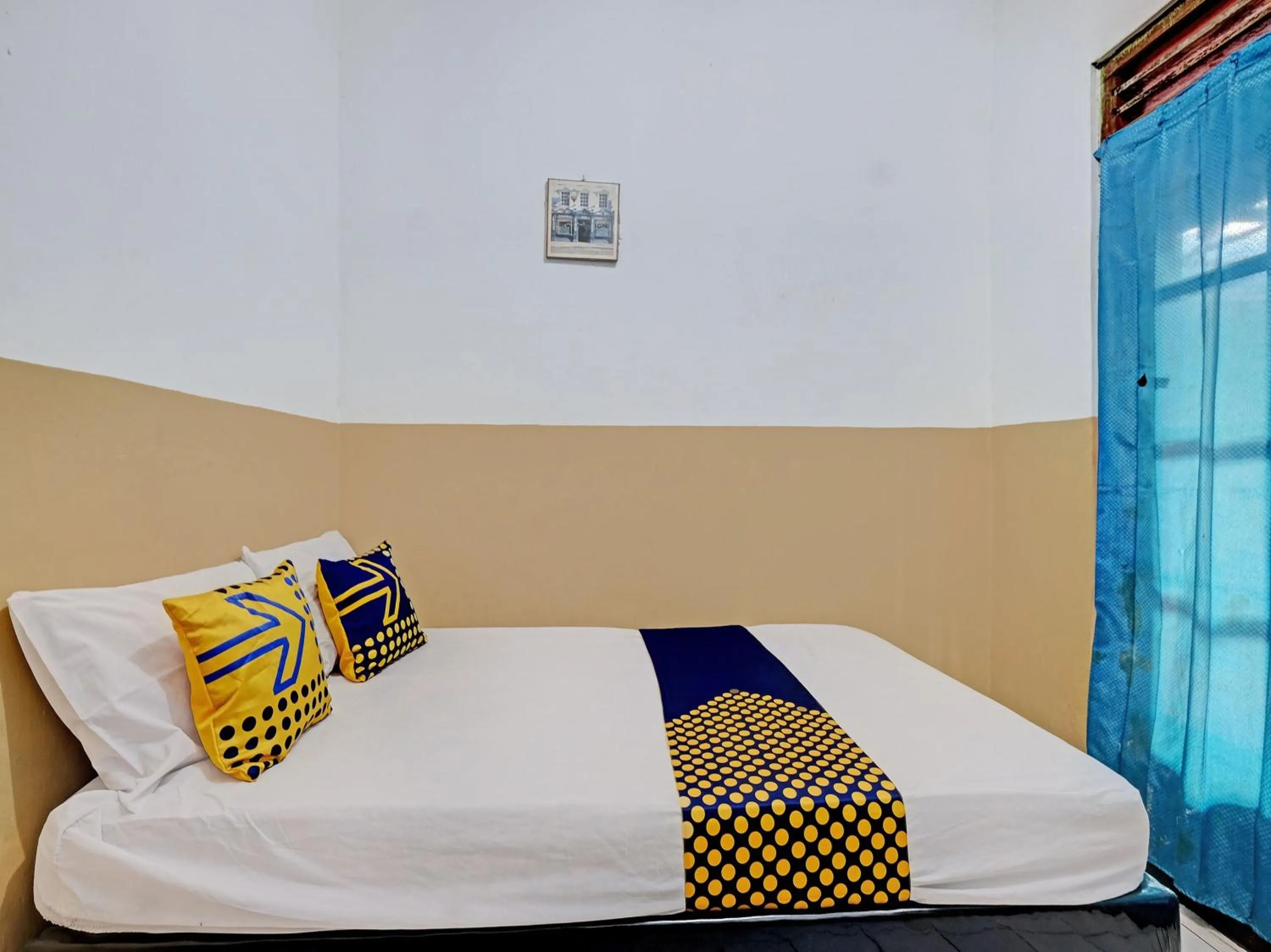 Bedroom in SPOT ON 92983 Hotel Ayu