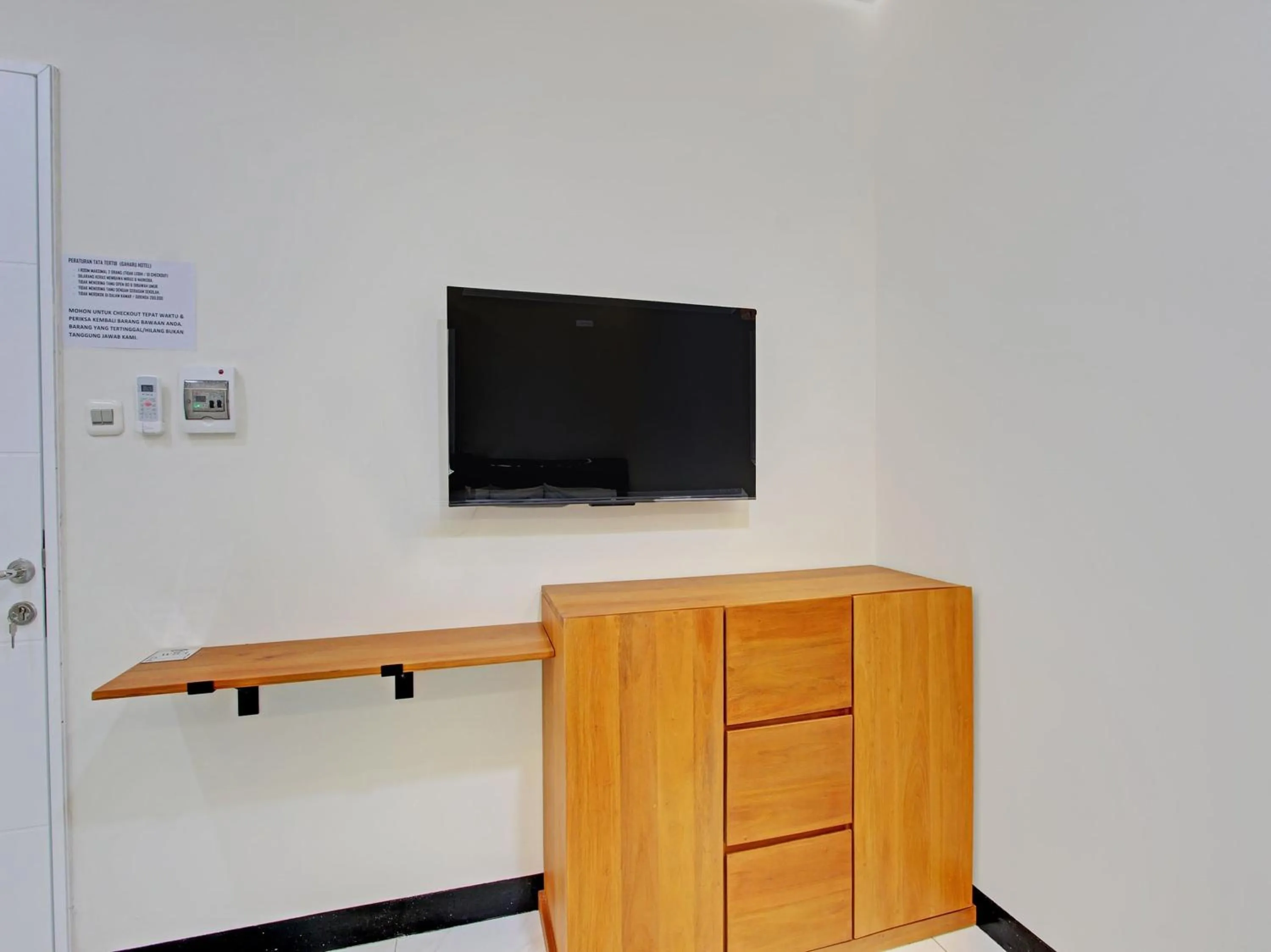 Bedroom in Collection O 92972 Gaharu Hotel