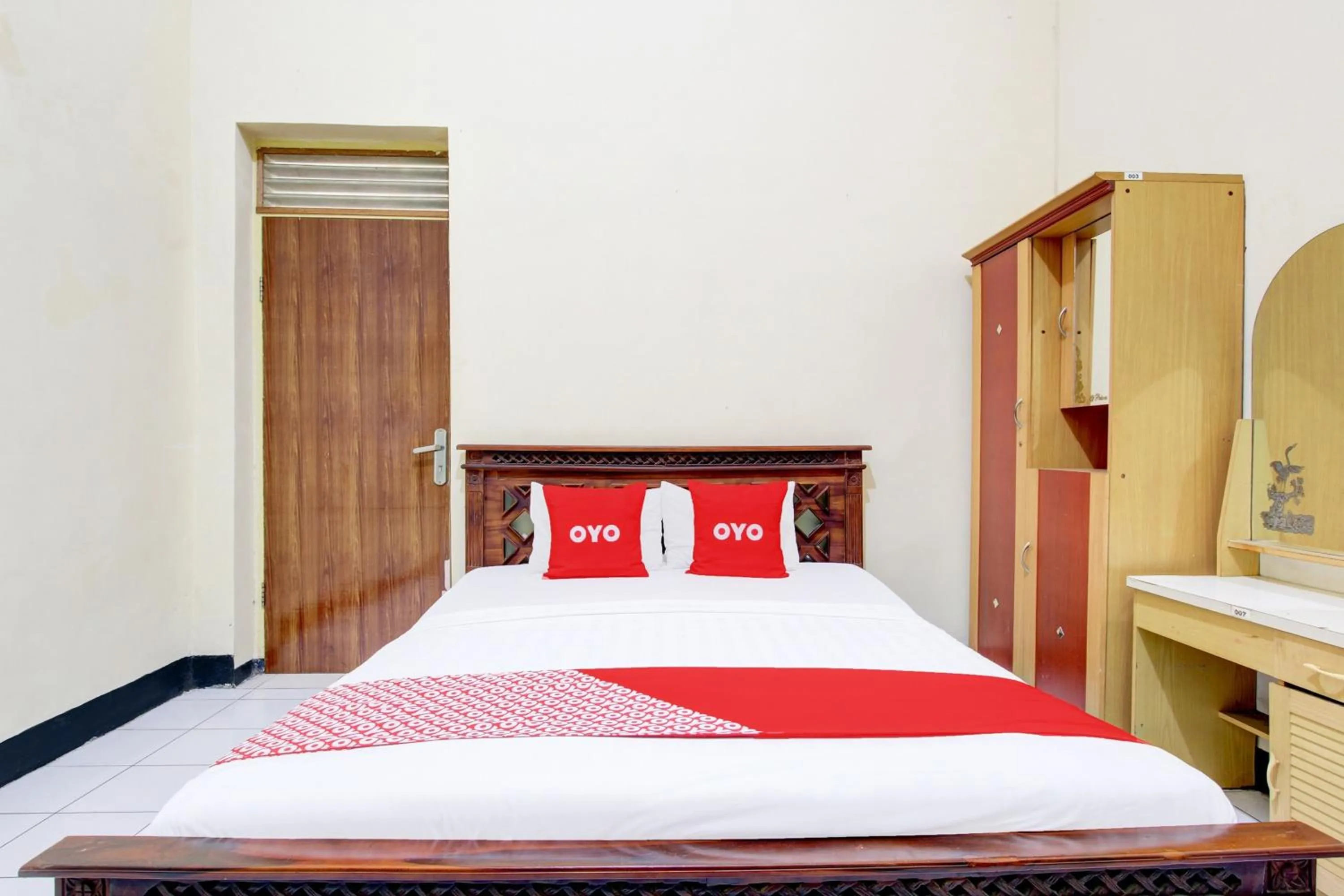 Bedroom in OYO 93048 Hotel Puri Mandiri