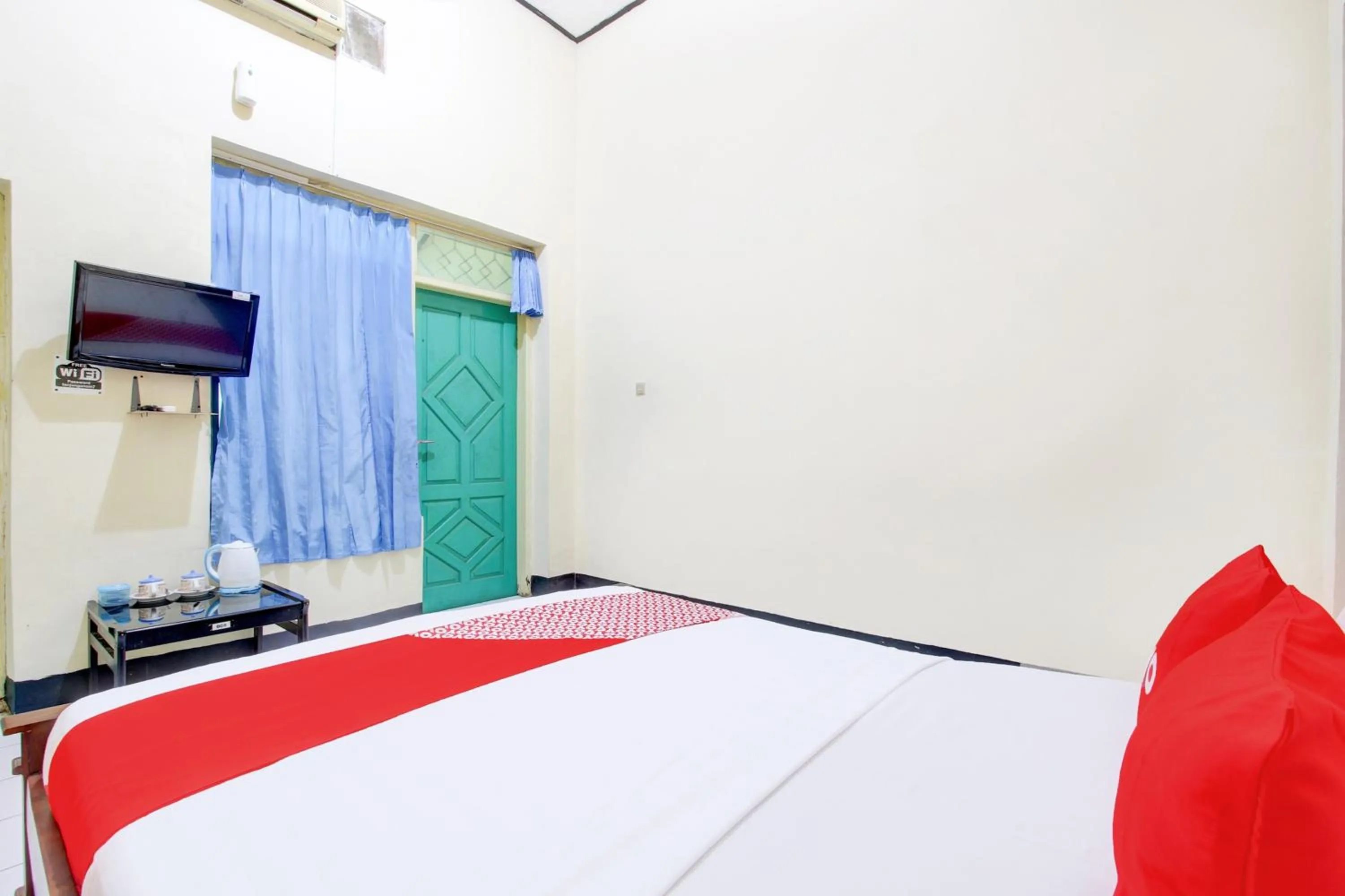 Bedroom in OYO 93048 Hotel Puri Mandiri