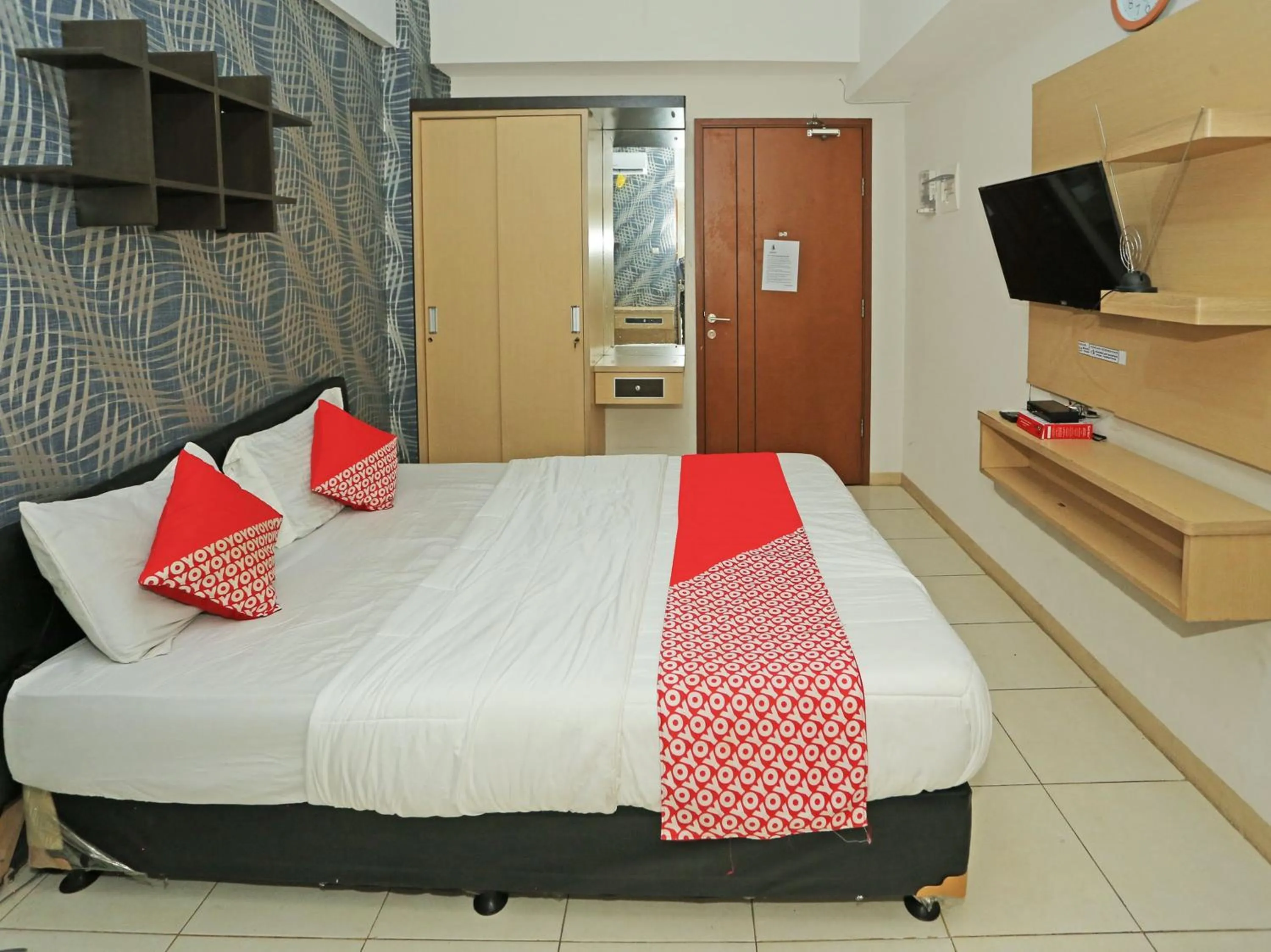 Bedroom in Capital O 92971 Pelangi Residence