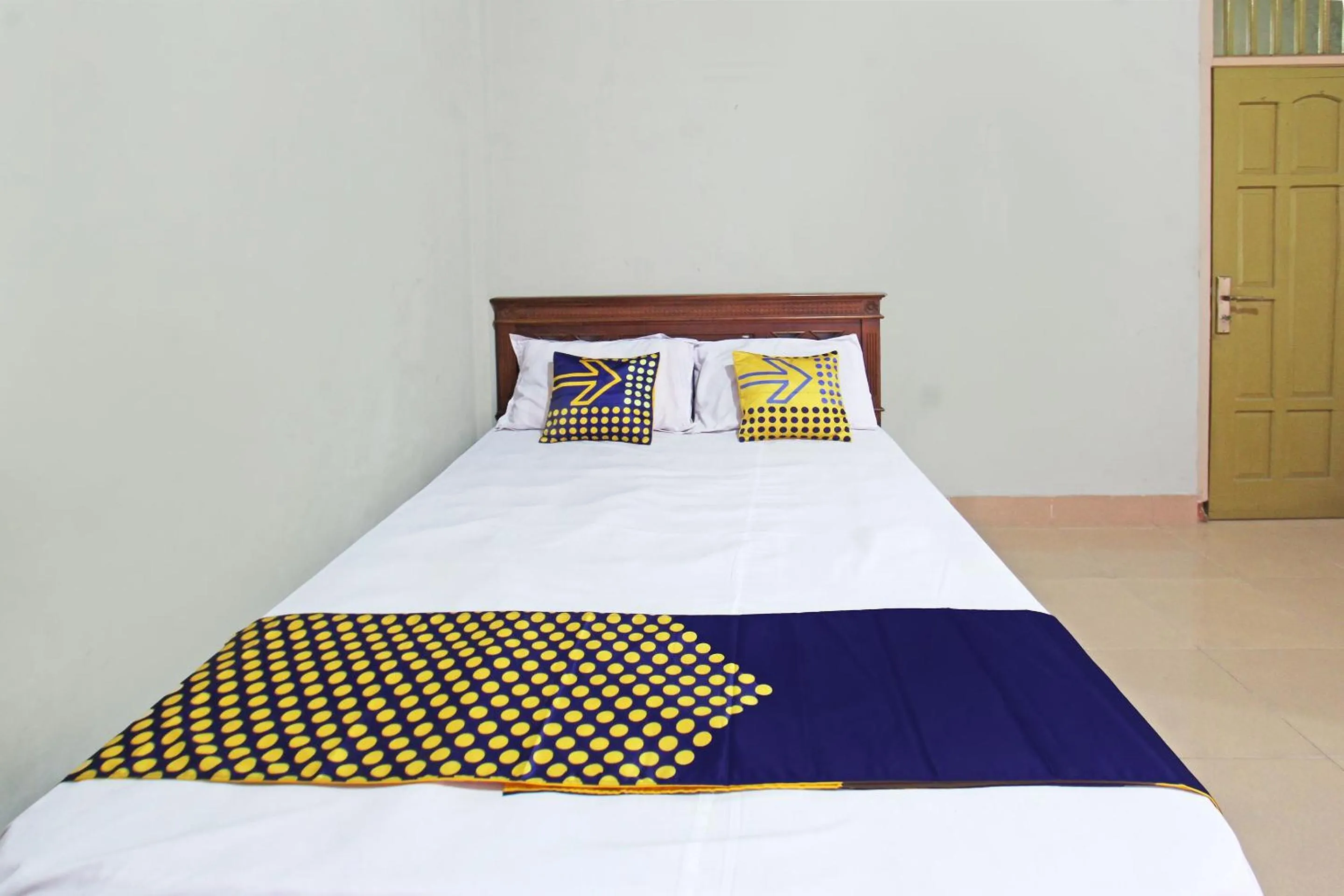 Bedroom in SPOT ON 92973 Madani Syariah Guesthouse