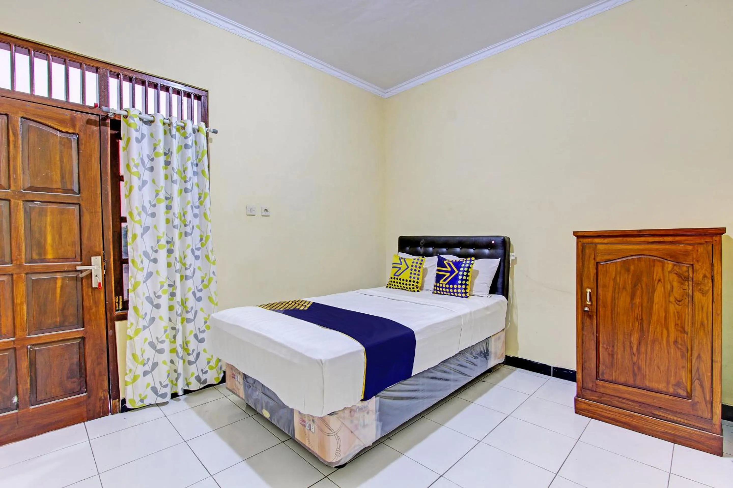 Bedroom in SPOT ON 93007 Guest House Lestari
