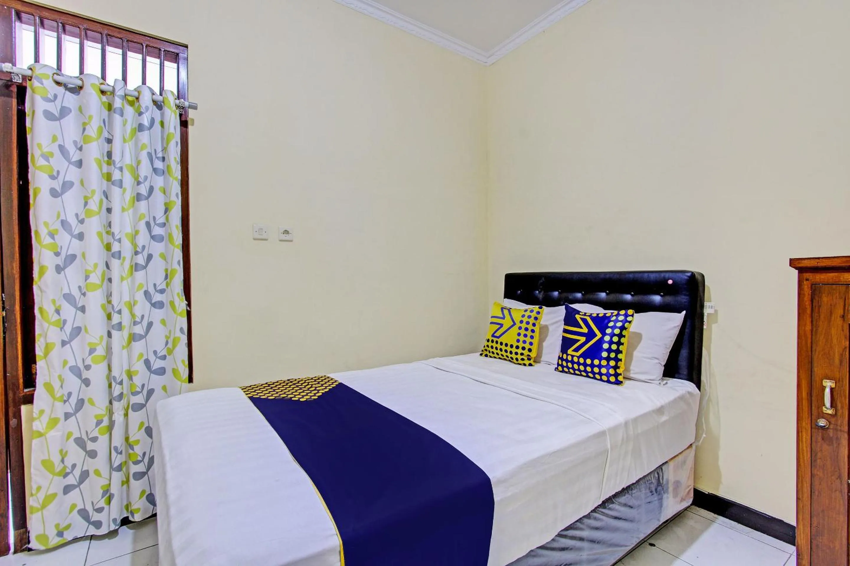 Bedroom in SPOT ON 93007 Guest House Lestari
