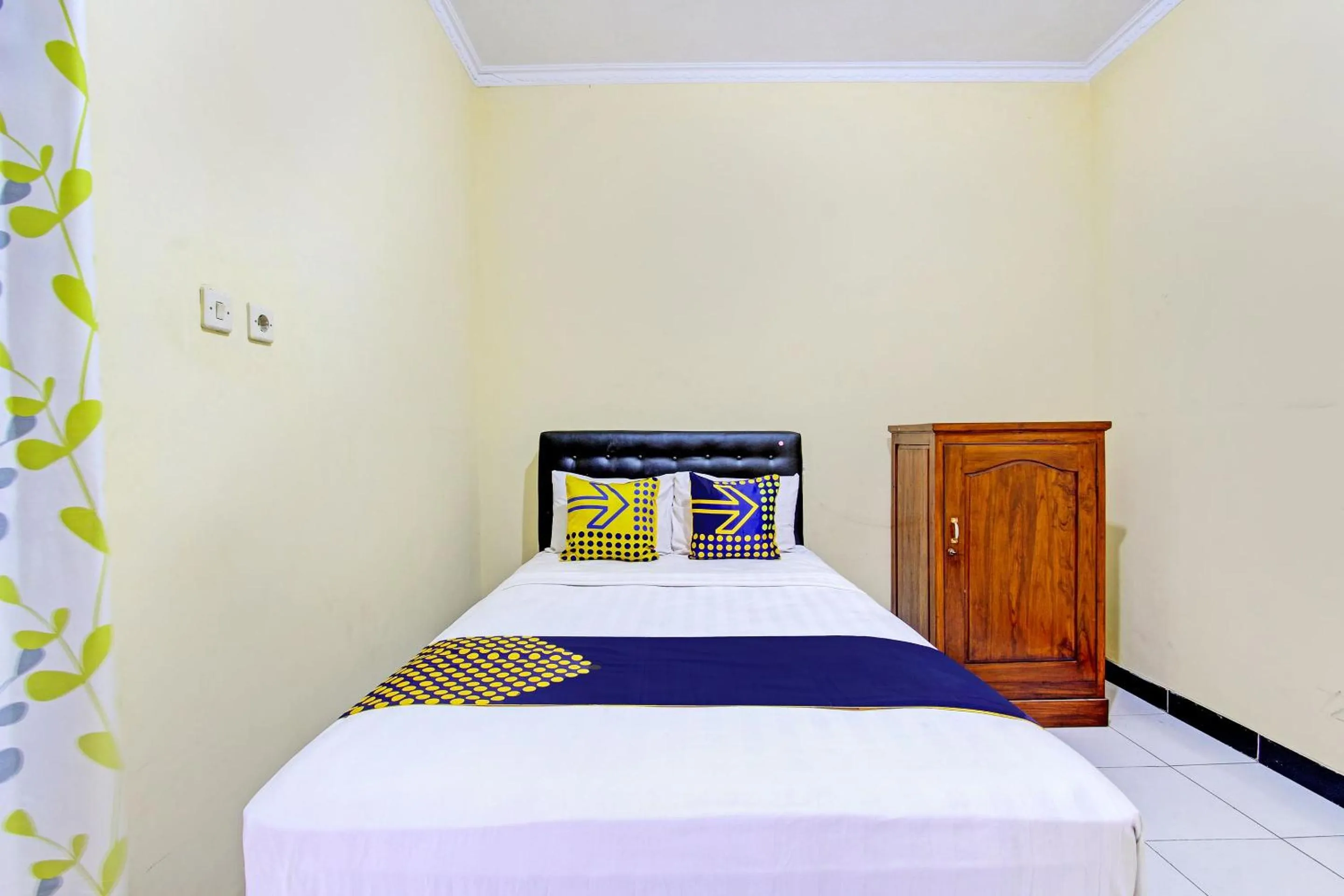 Bedroom in SPOT ON 93007 Guest House Lestari