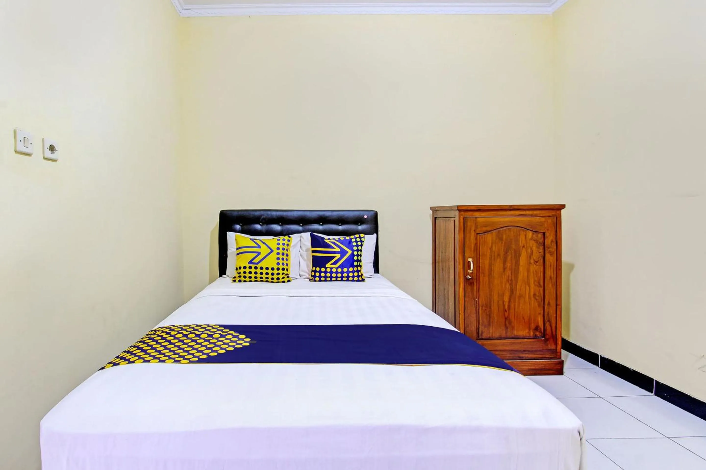 Bedroom in SPOT ON 93007 Guest House Lestari