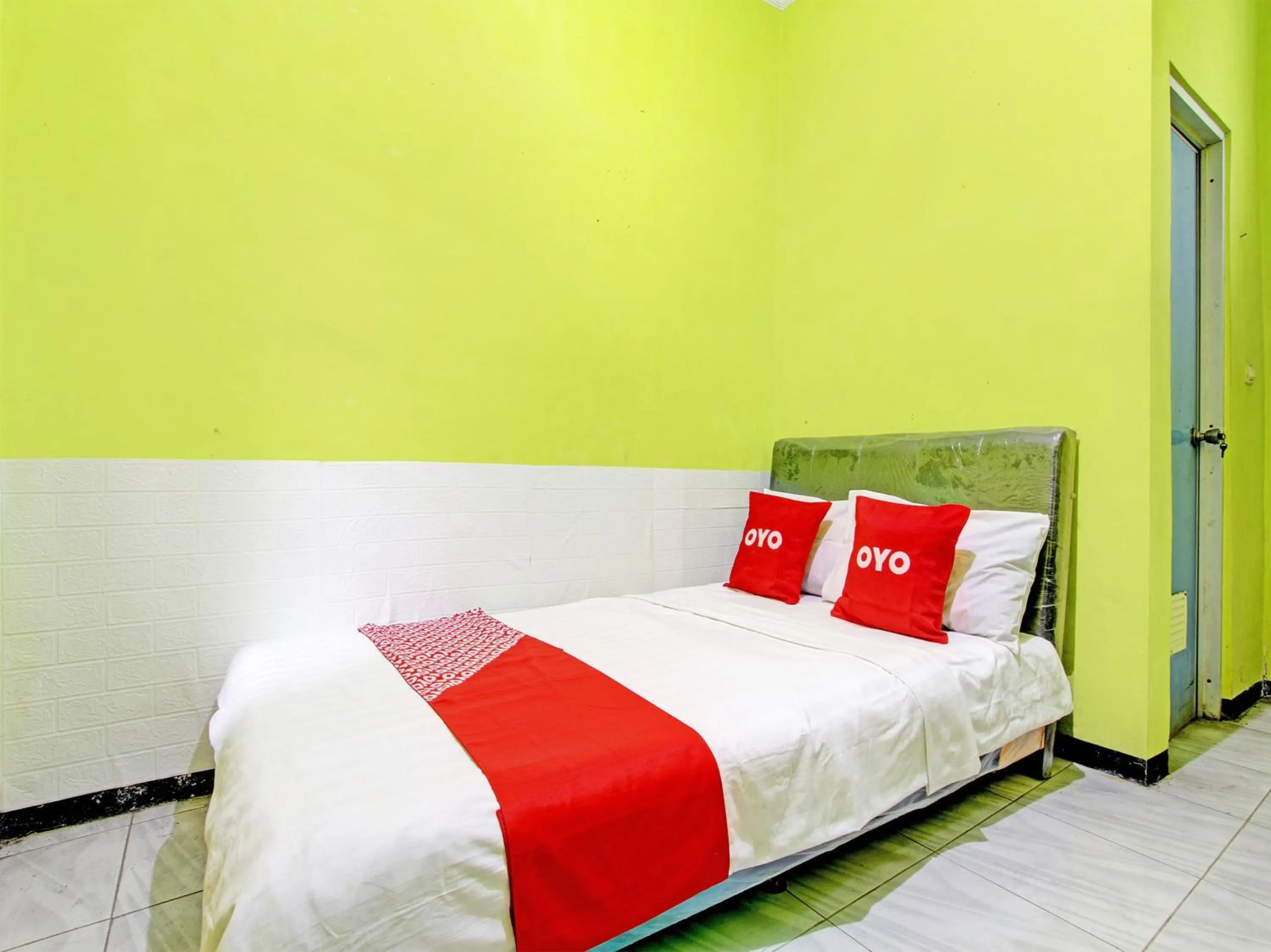 Bedroom in OYO 92998 Wiludjeng Guesthouse