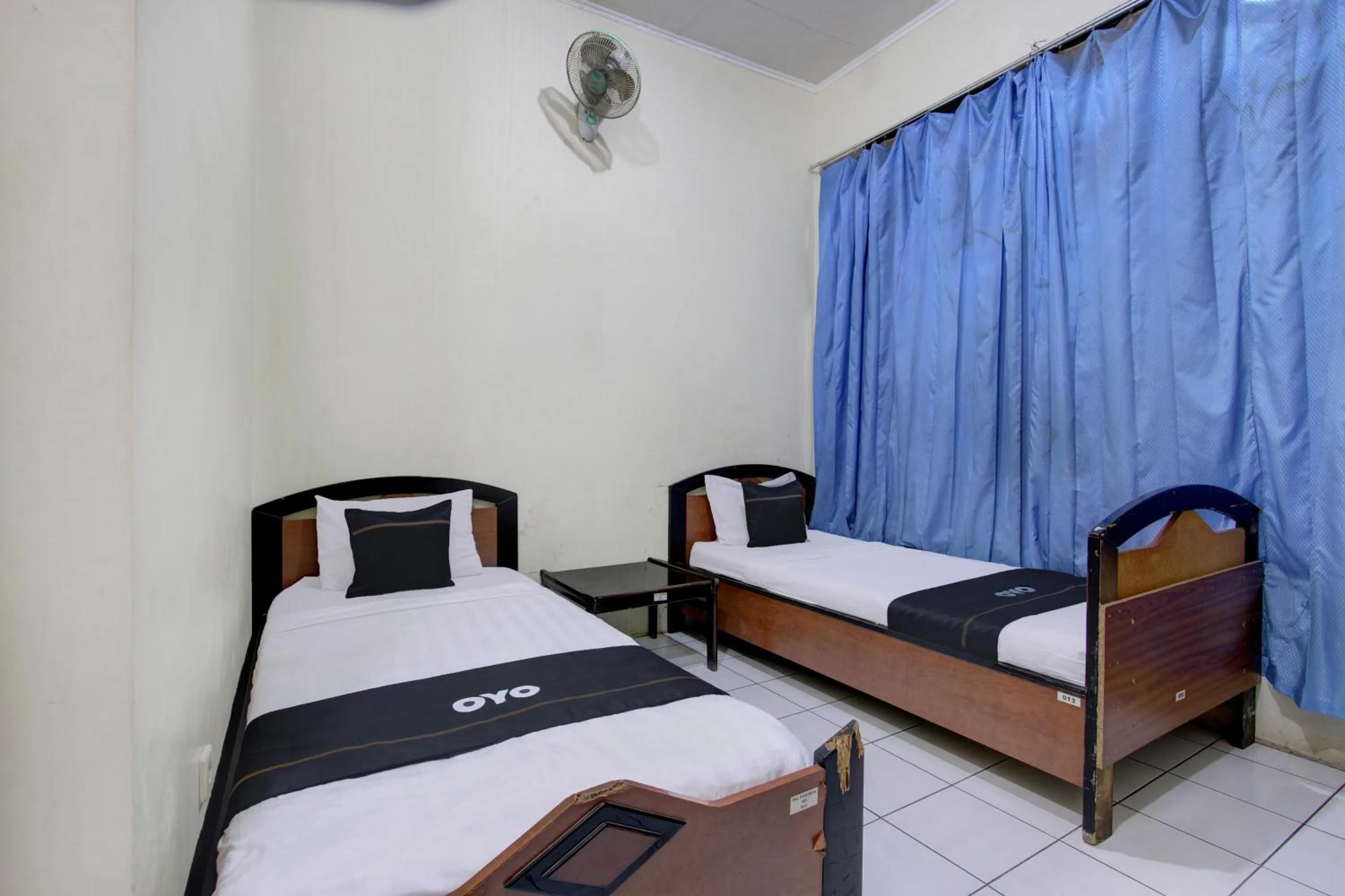 Bedroom in Capital O 93024 Hotel Ganesha