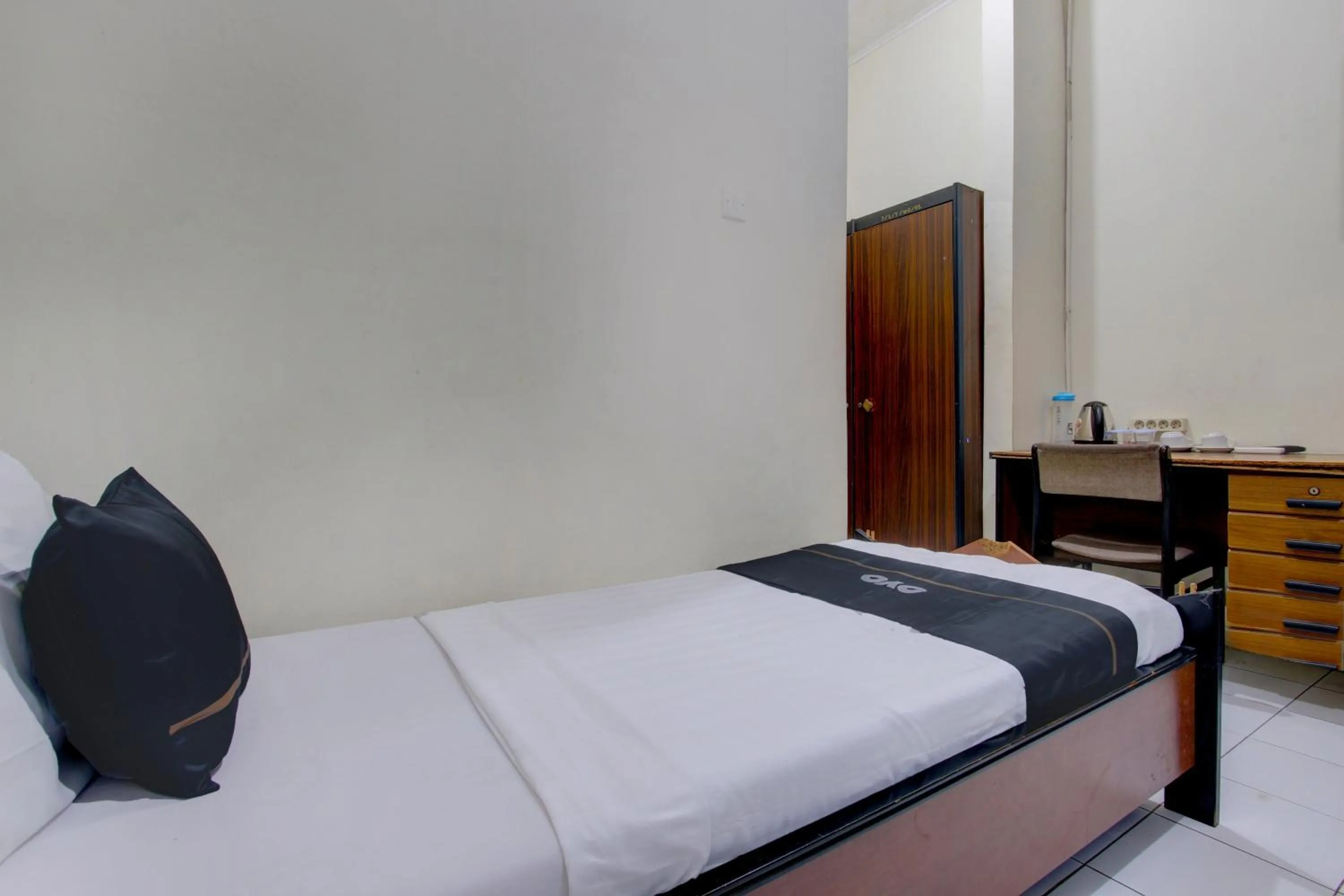 Bedroom in Capital O 93024 Hotel Ganesha