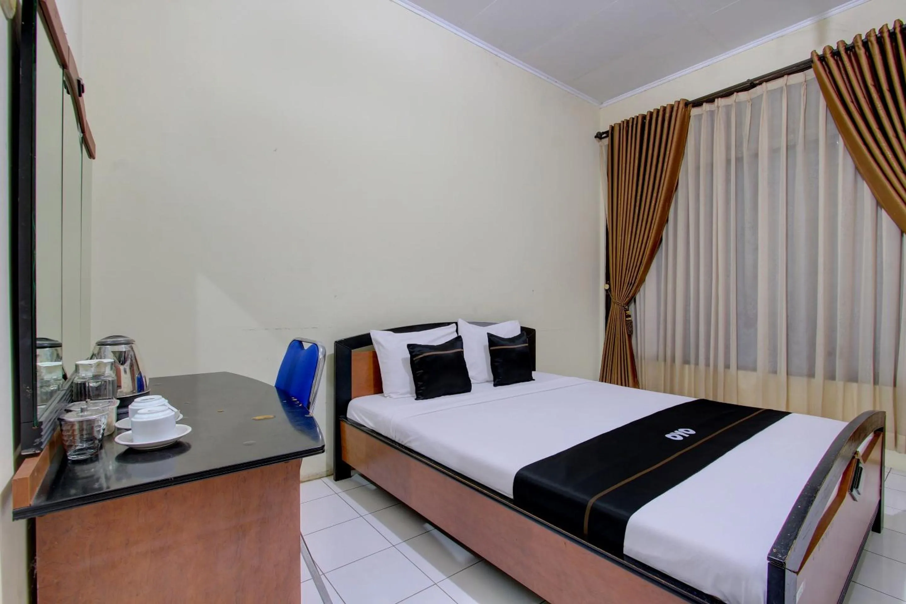 Bedroom in Capital O 93024 Hotel Ganesha