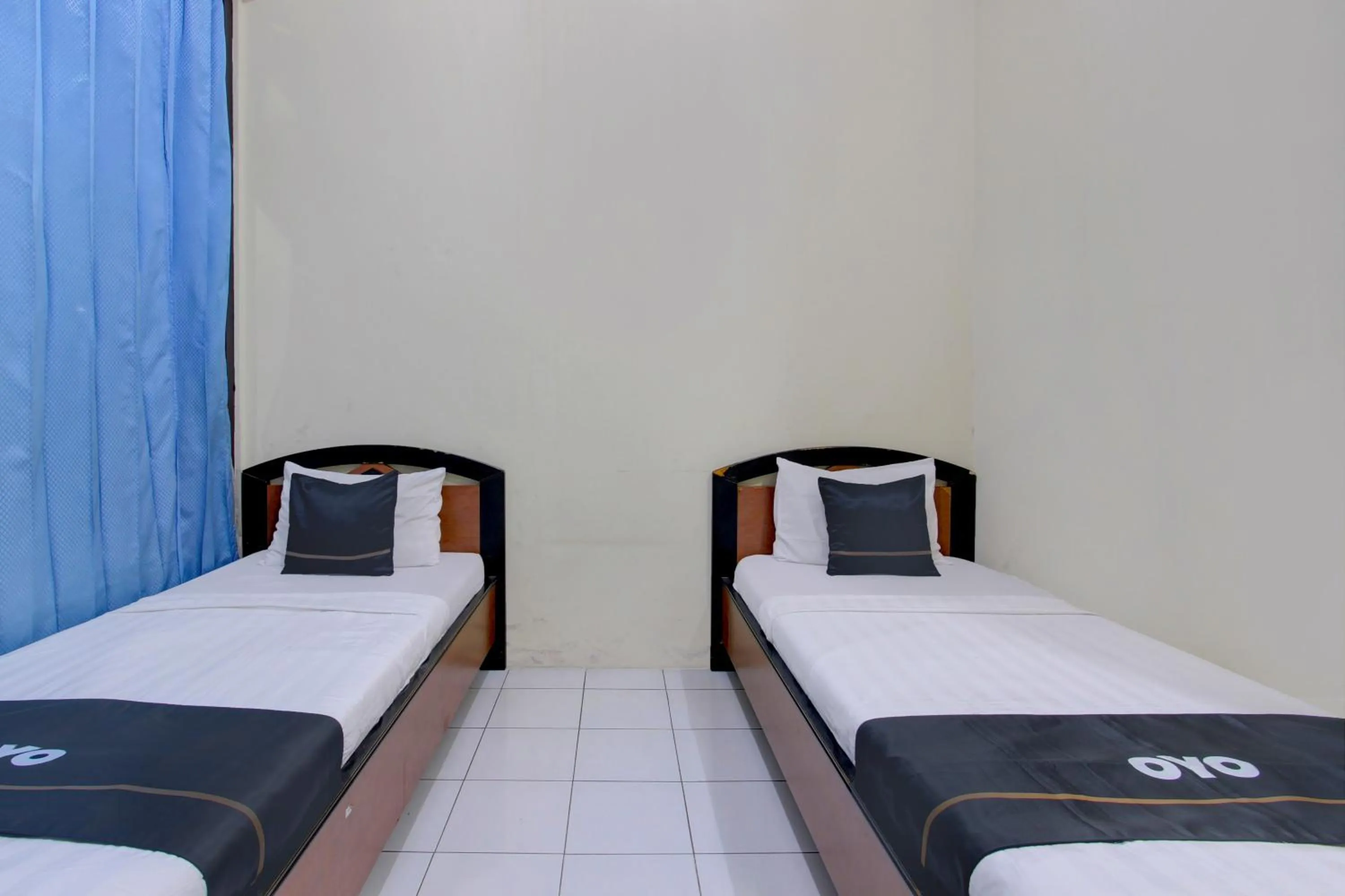 Bedroom in Capital O 93024 Hotel Ganesha