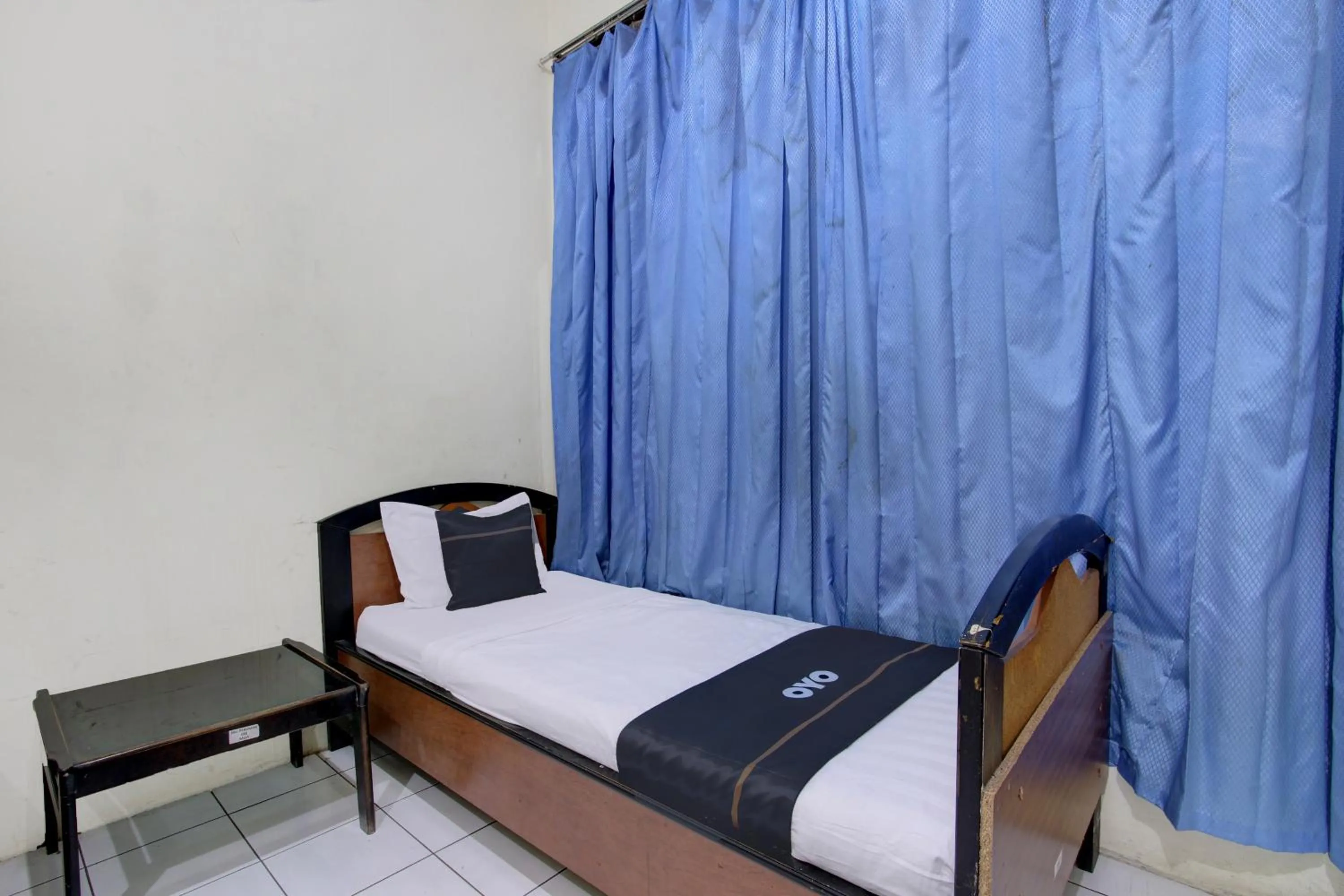 Bedroom in Capital O 93024 Hotel Ganesha