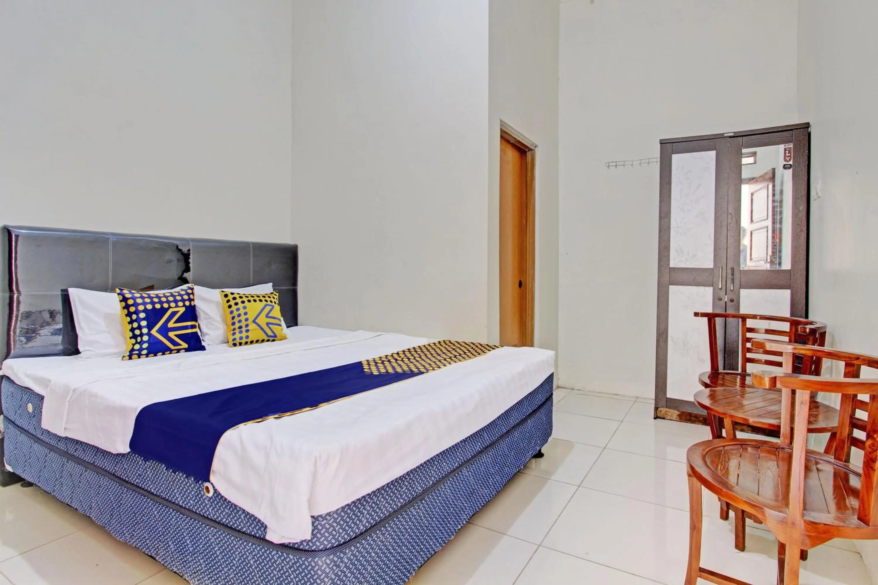 Bedroom in Hotel O Guest House Cemara 1 Syariah