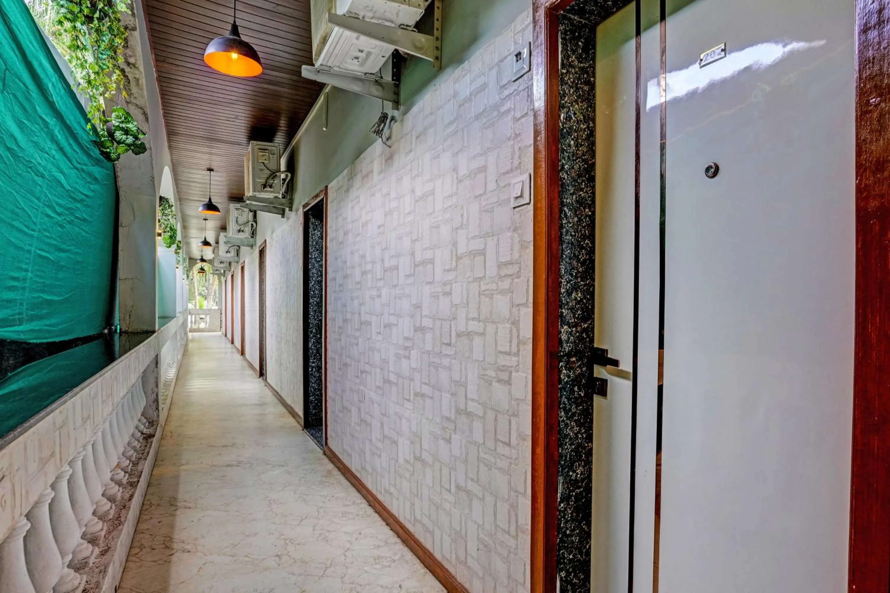 Lobby or reception, Balcony/Terrace in Collection O Palm Springs Beach Resort