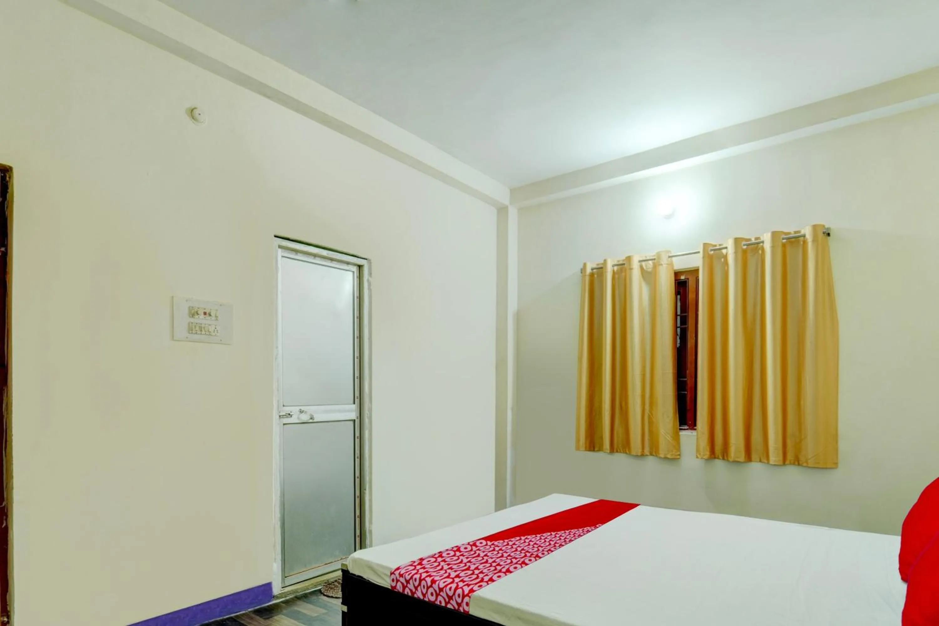 Bedroom in OYO Flagship Hotel Shubhmangalam