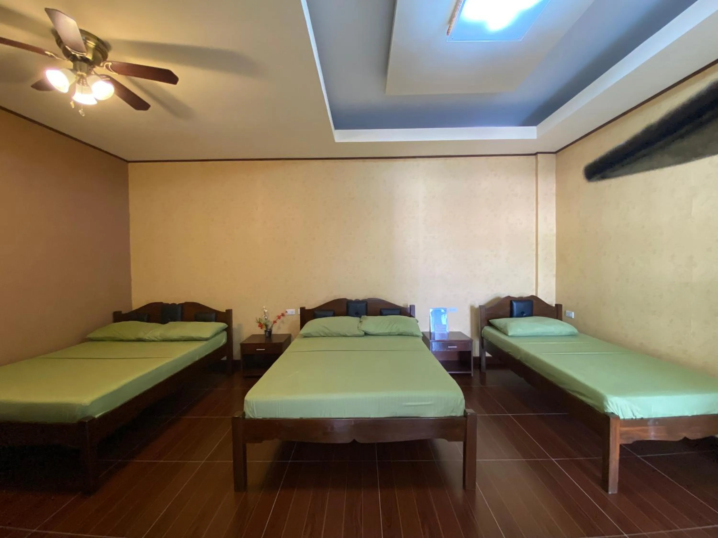 Photo of the whole room, Bed in MinshukuKCS Hotel and Restaurant